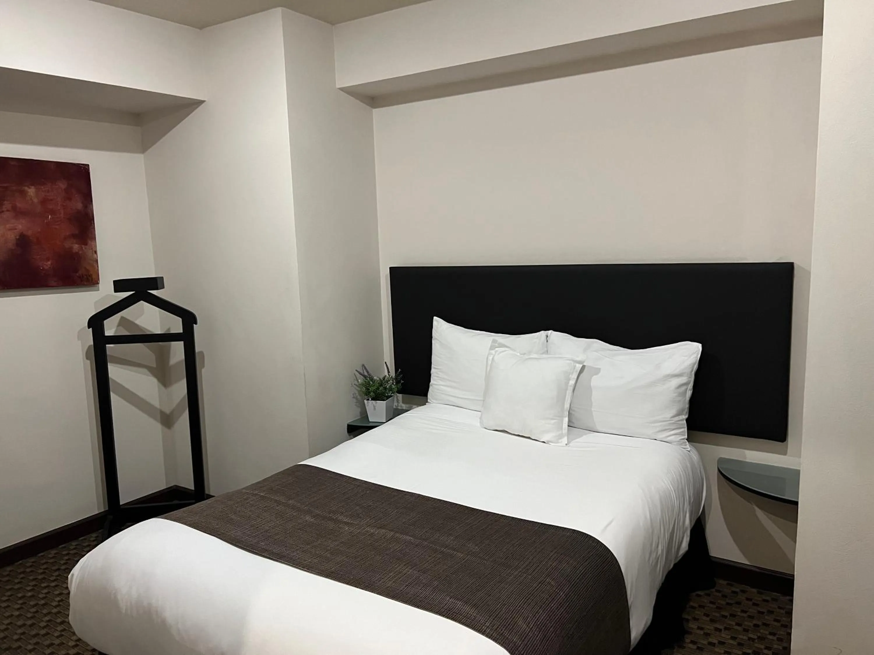 Bed in St Isidro Suites Corporate Housing SPA & Wellness Center