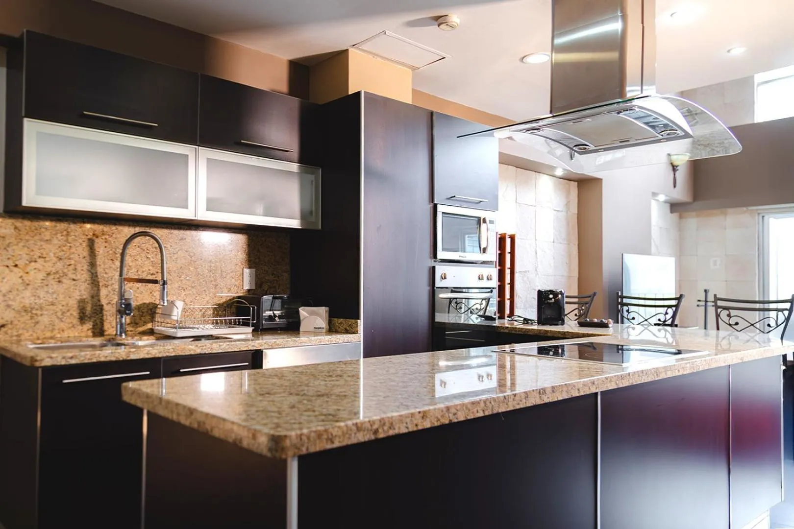 Kitchen or kitchenette in St Isidro Suites Corporate Housing SPA & Wellness Center