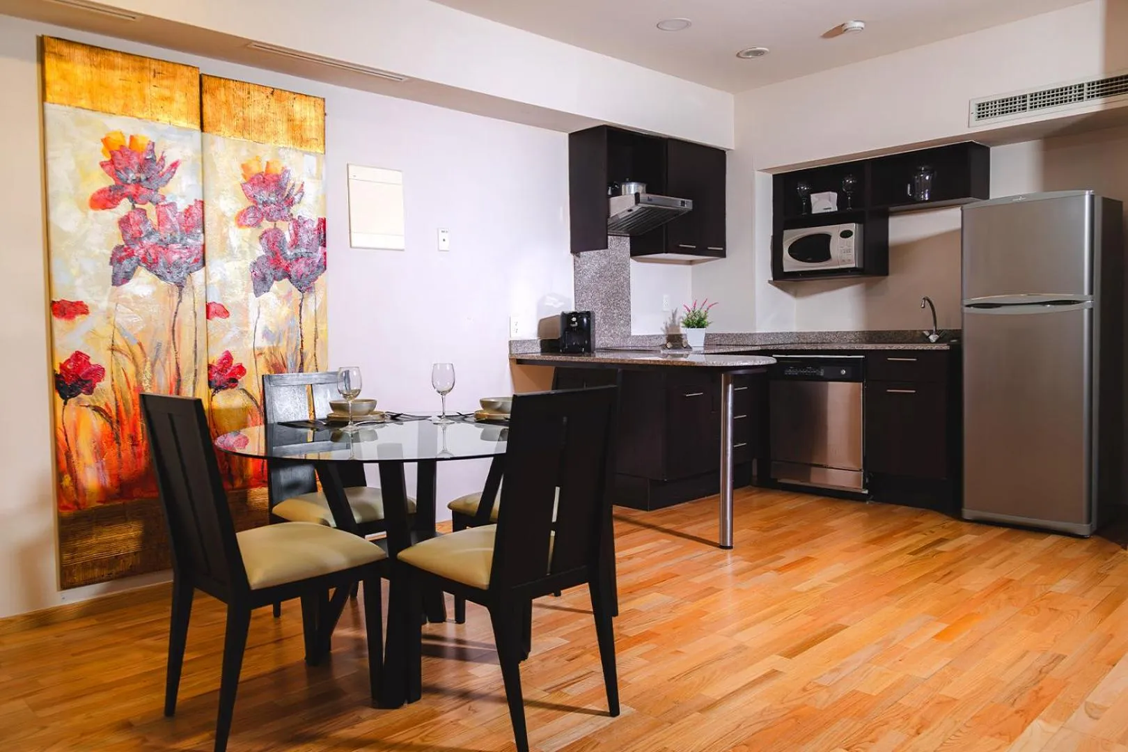 Kitchen or kitchenette in St Isidro Suites Corporate Housing SPA & Wellness Center