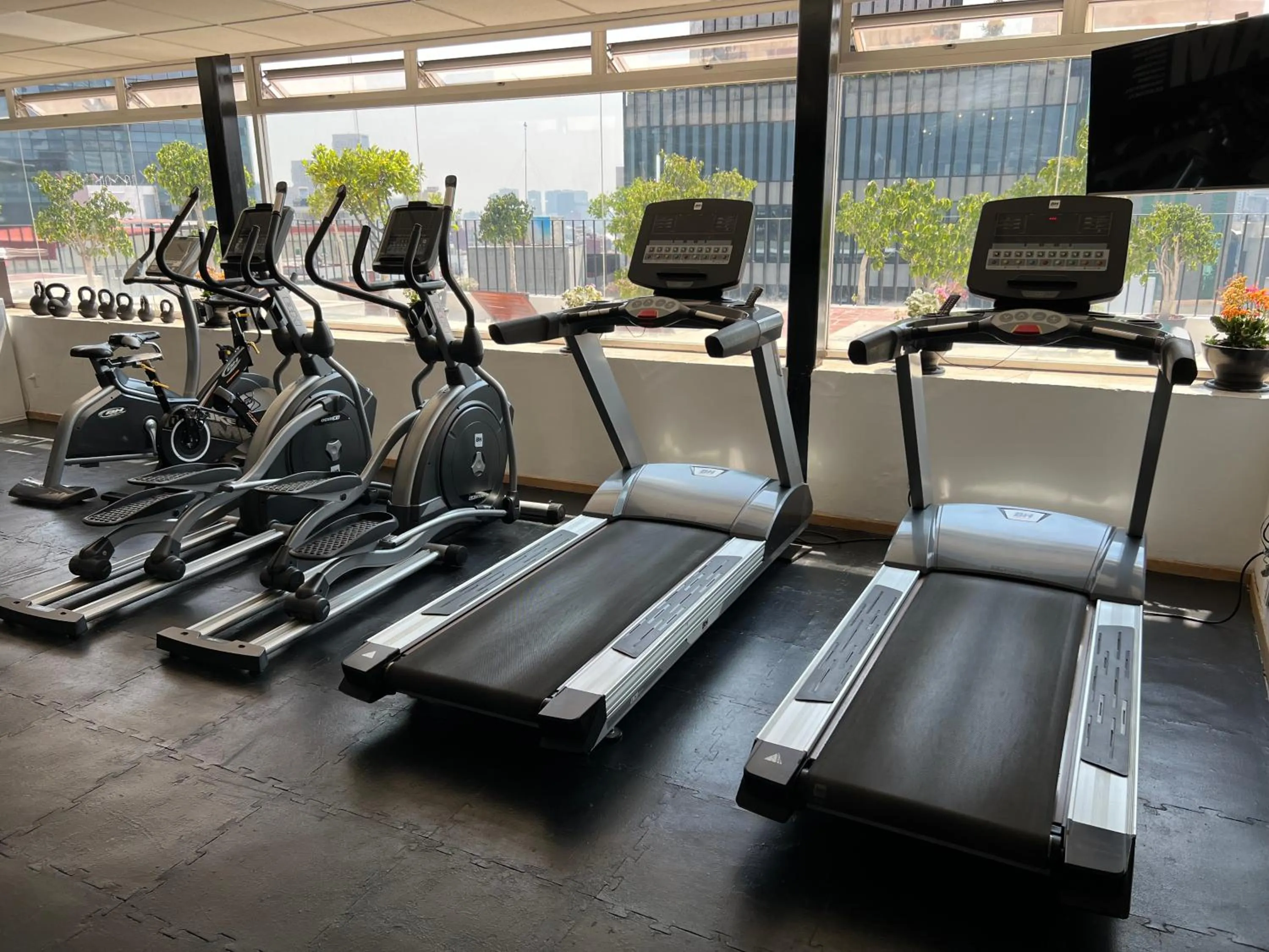 Fitness centre/facilities in St Isidro Suites Corporate Housing SPA & Wellness Center