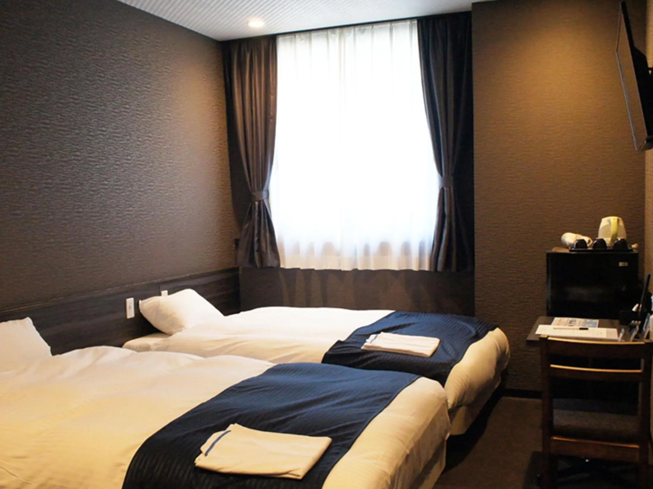 Bed in Hotel Abest Osu Kannon Ekimae Hane no Yu