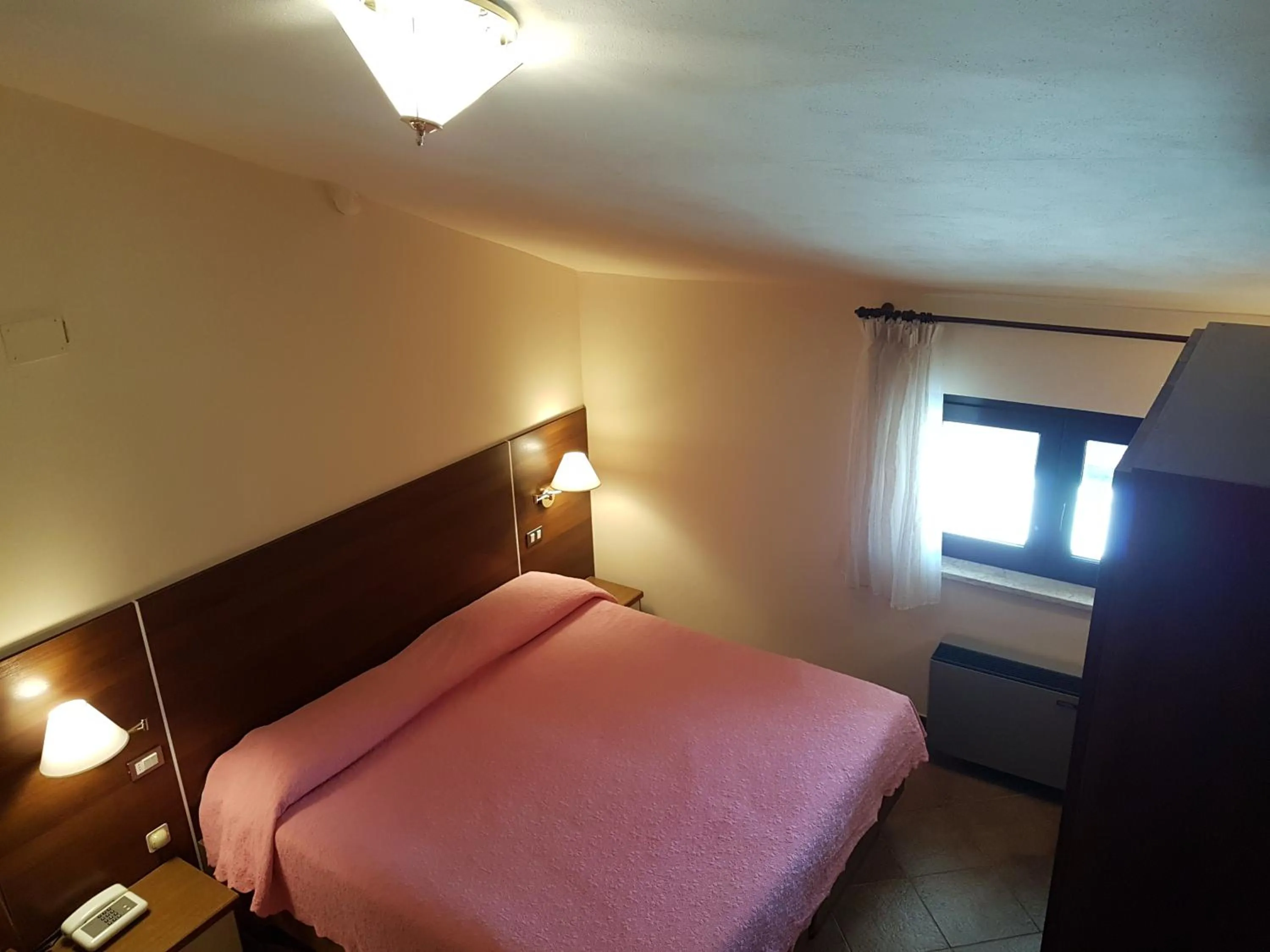 Bed in Hotel del Lago Ampollino