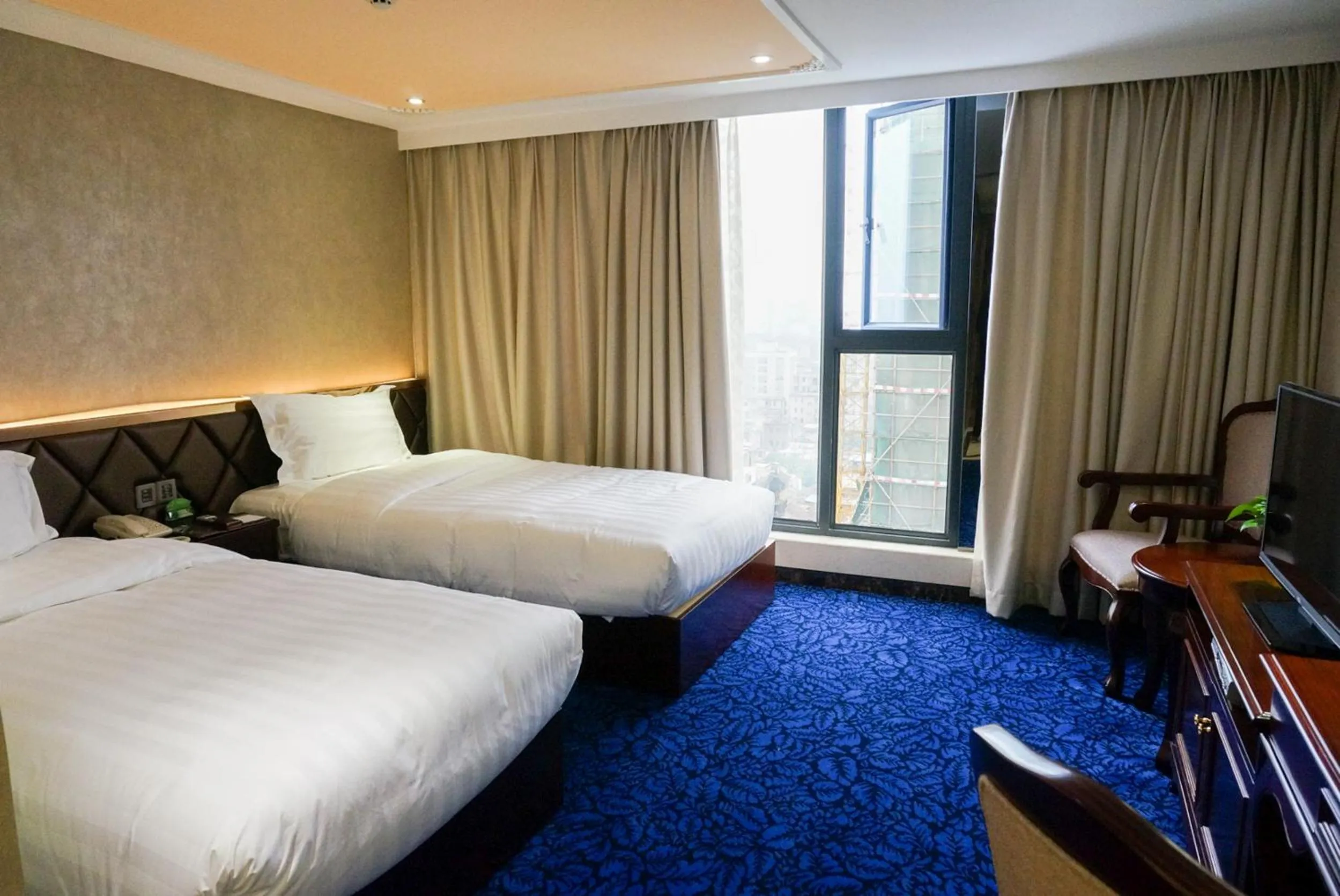 Bedroom in Zhuhai Special Economic Zone Hotel