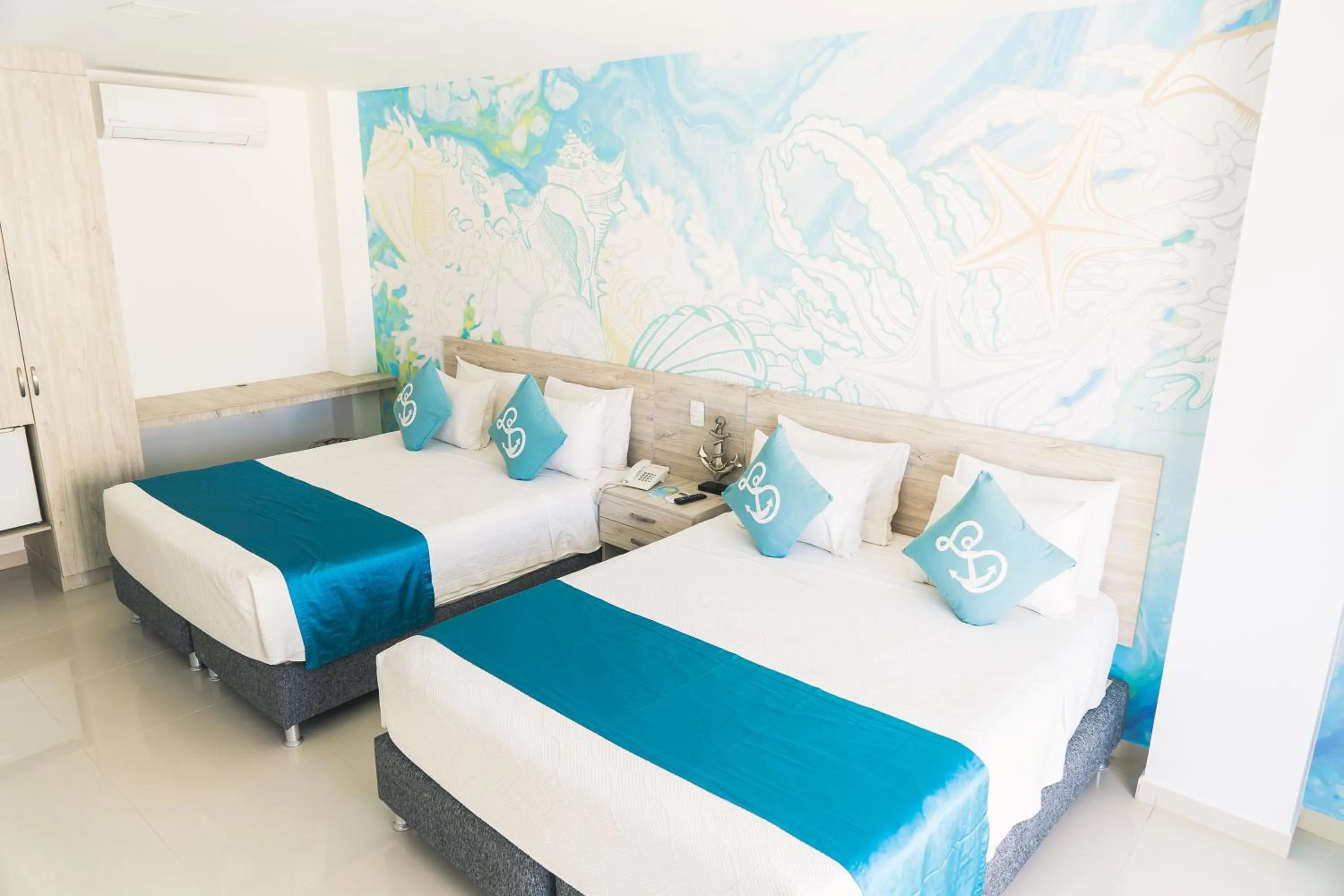 Photo of the whole room, Bed in Sea Colors Hotel