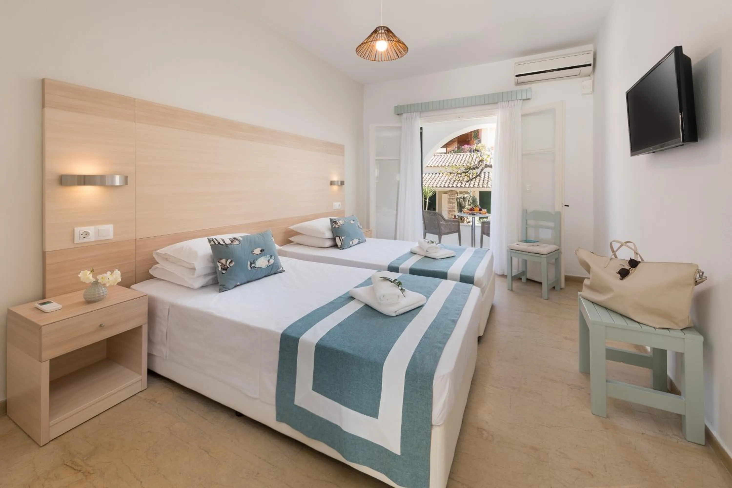 Bedroom, Bed in Iliada Beach Hotel