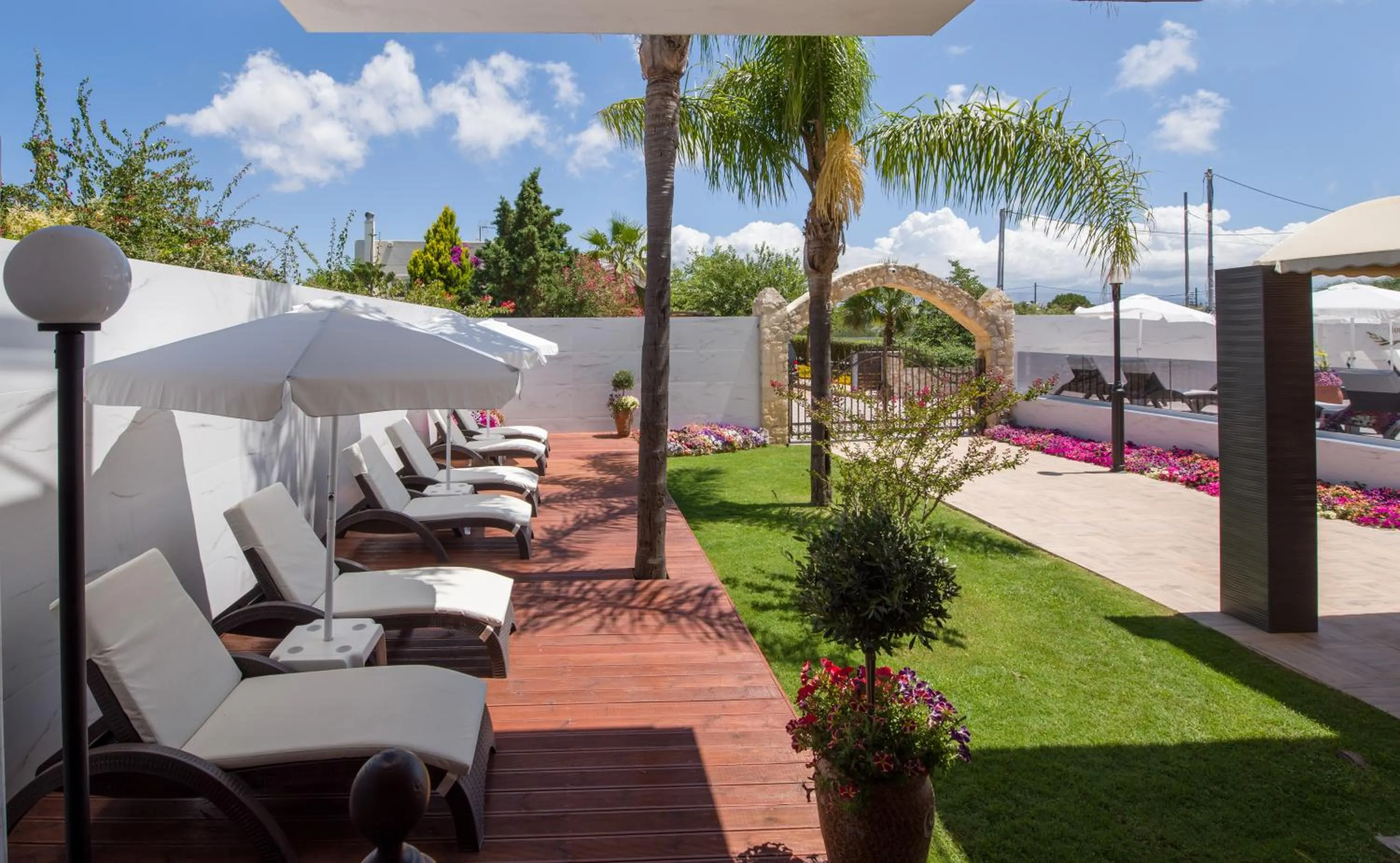 Patio in Paradice Hotel Luxury Suites-Near zorbas Beach-FREE Breakfast