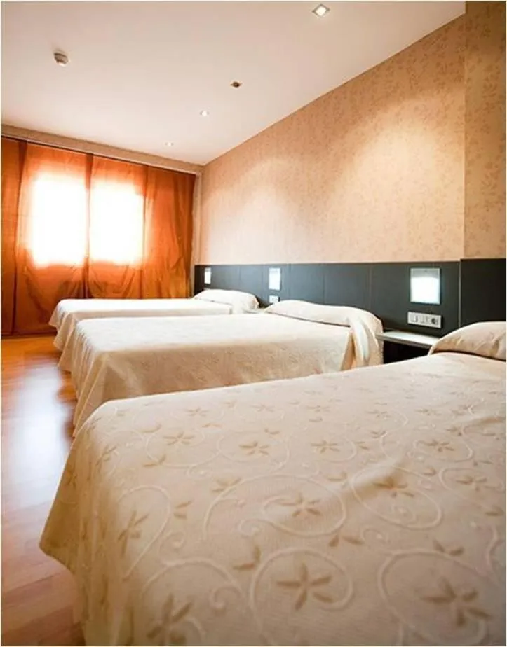 Photo of the whole room, Bed in Hotel Area Serrano