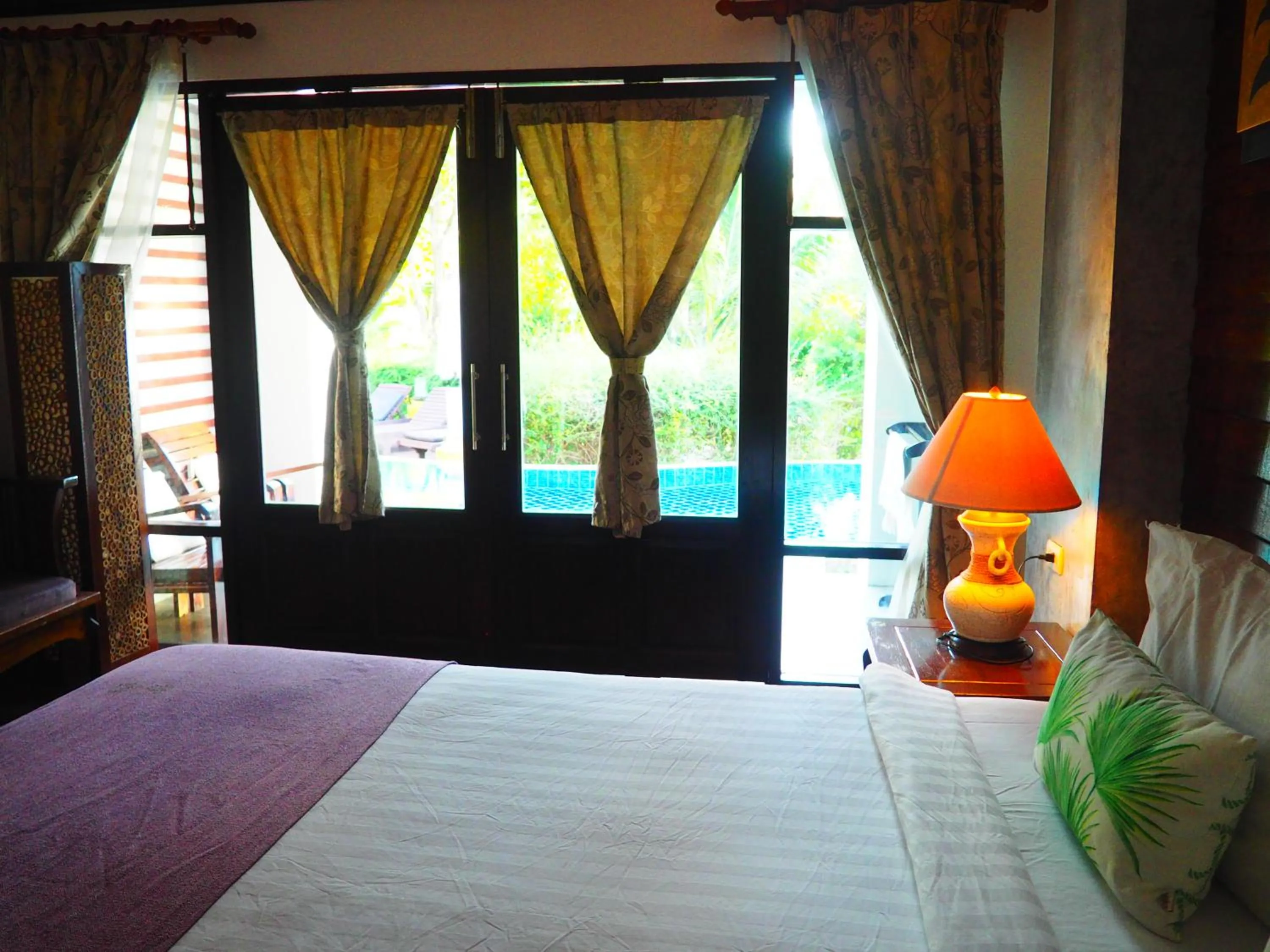 Photo of the whole room, Bed in Seashell Resort Koh Tao-SHA Plus