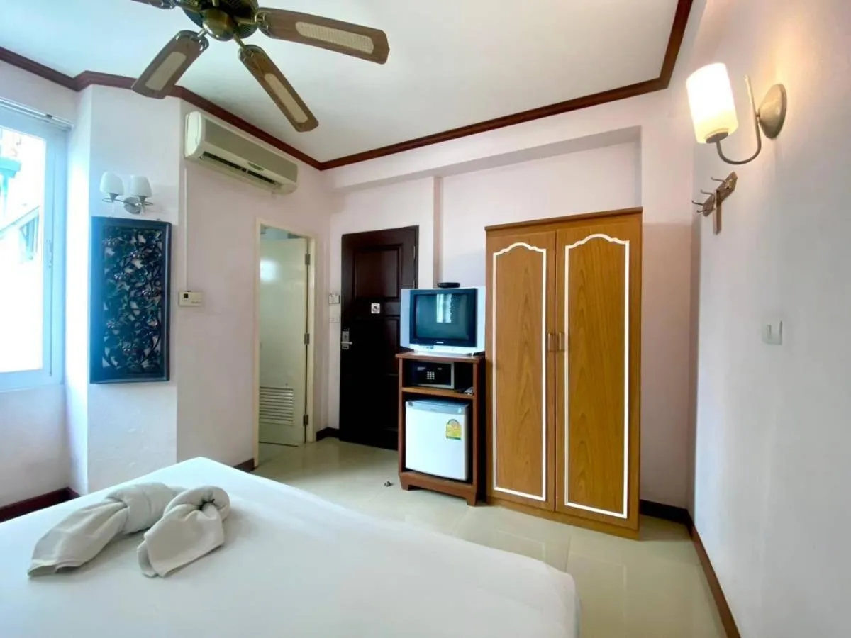 Bed in New Siam III Guest House