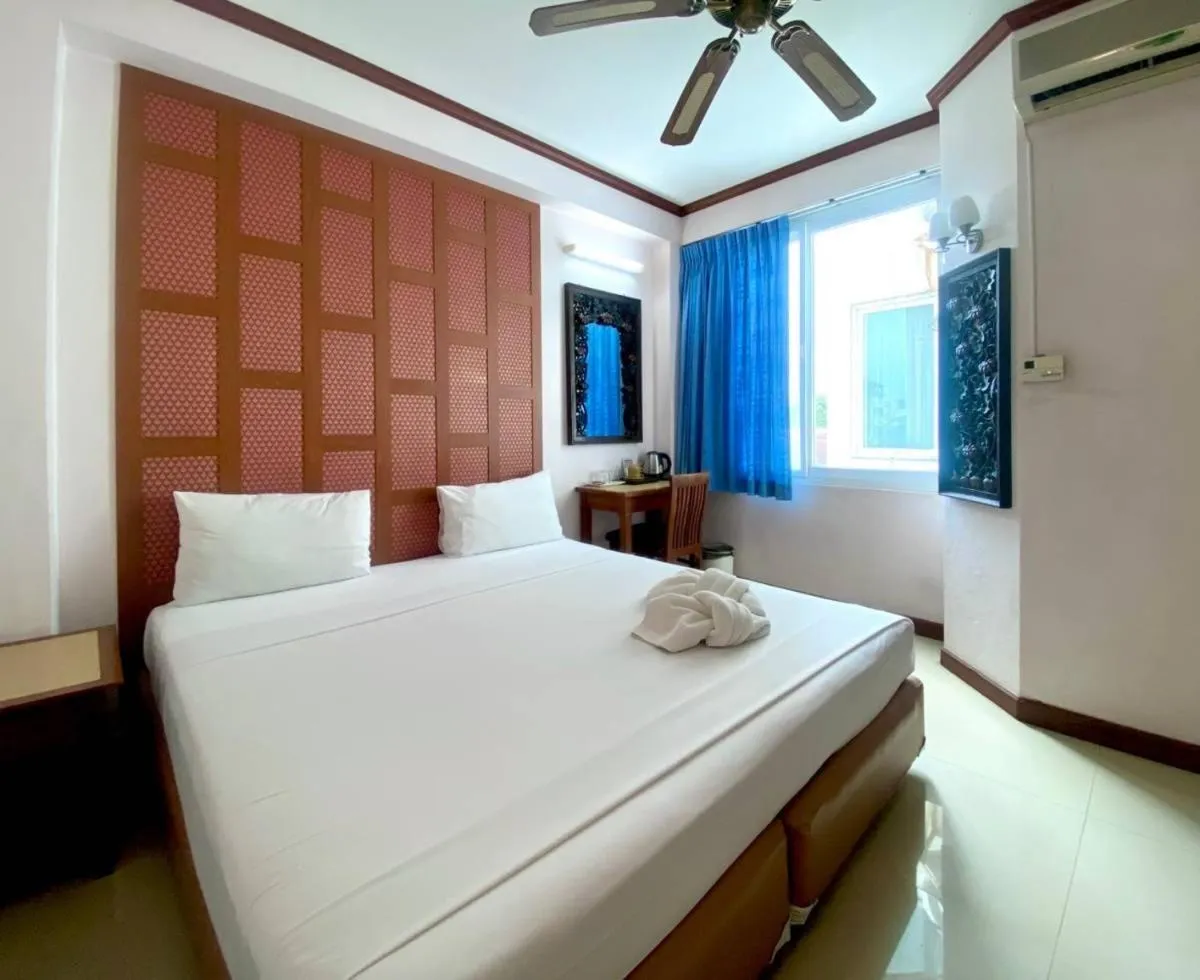 Bed in New Siam III Guest House