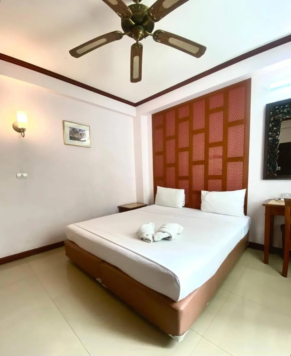 Bed in New Siam III Guest House