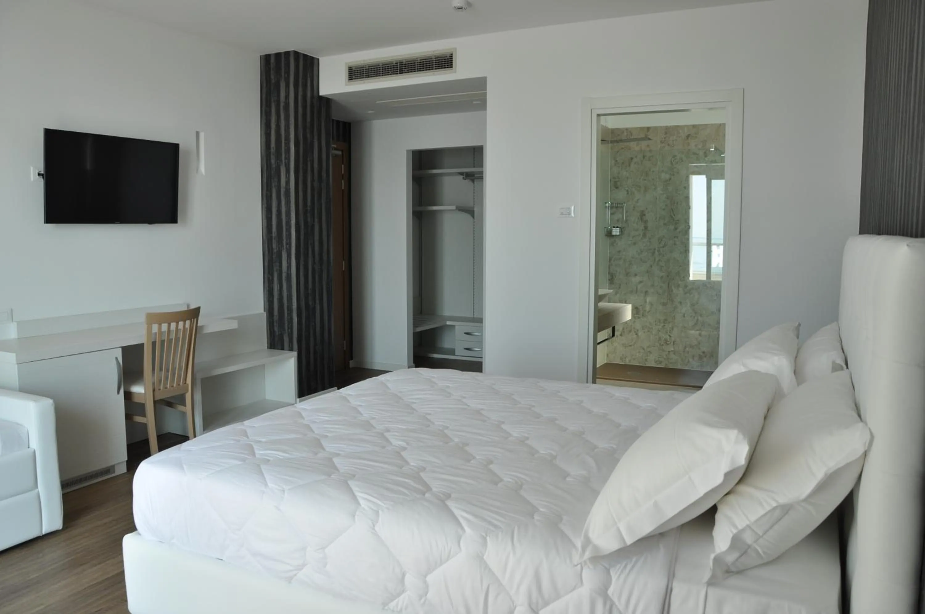 Bed in Hotel Columbia & Ninfea