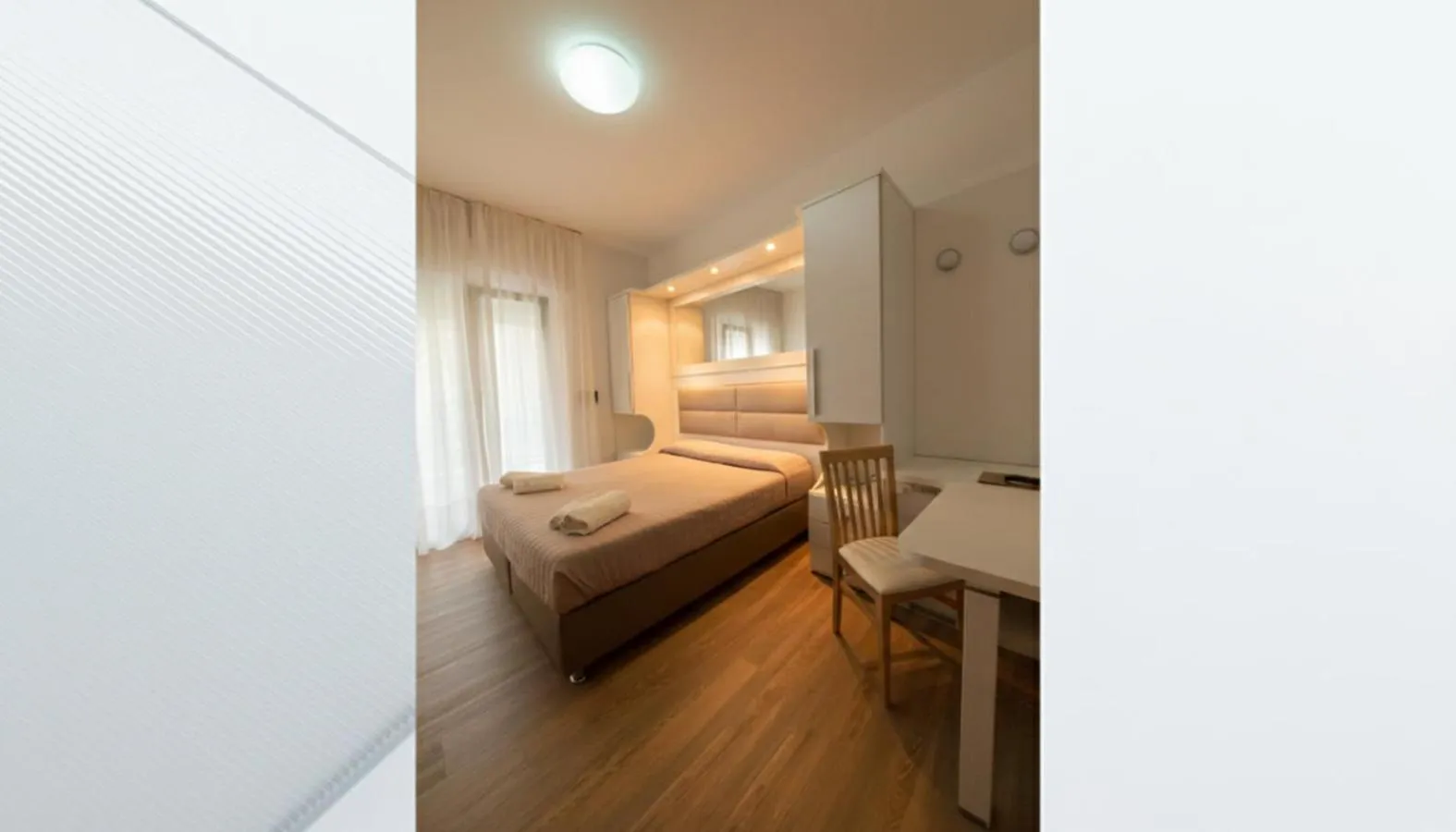 Bed in Hotel Columbia & Ninfea