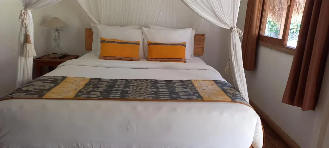 Bed in Rua Beach Resort Sumba