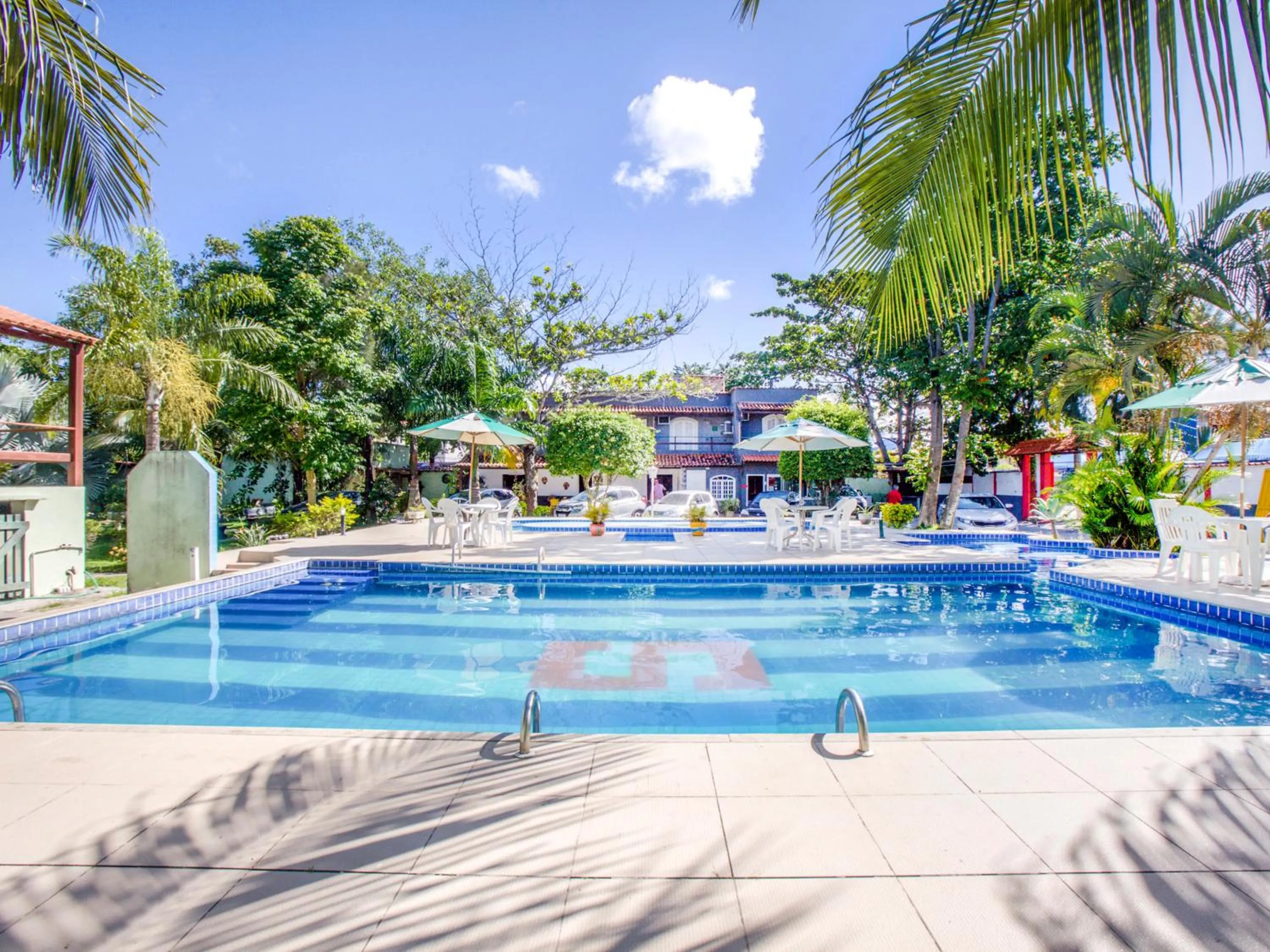 Swimming pool in OYO Pousada Recanto Shangrilá, Cabo Frio