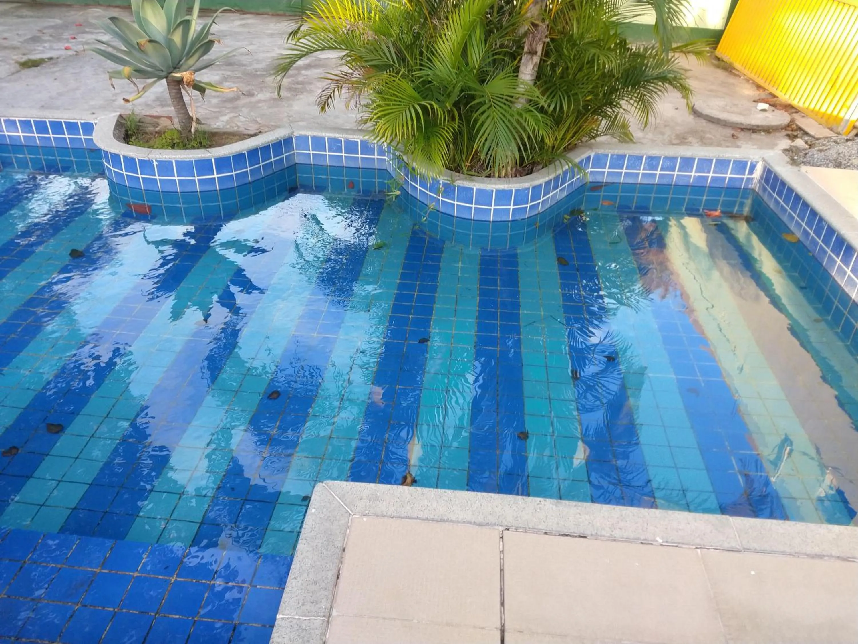 Swimming pool in OYO Pousada Recanto Shangrilá, Cabo Frio