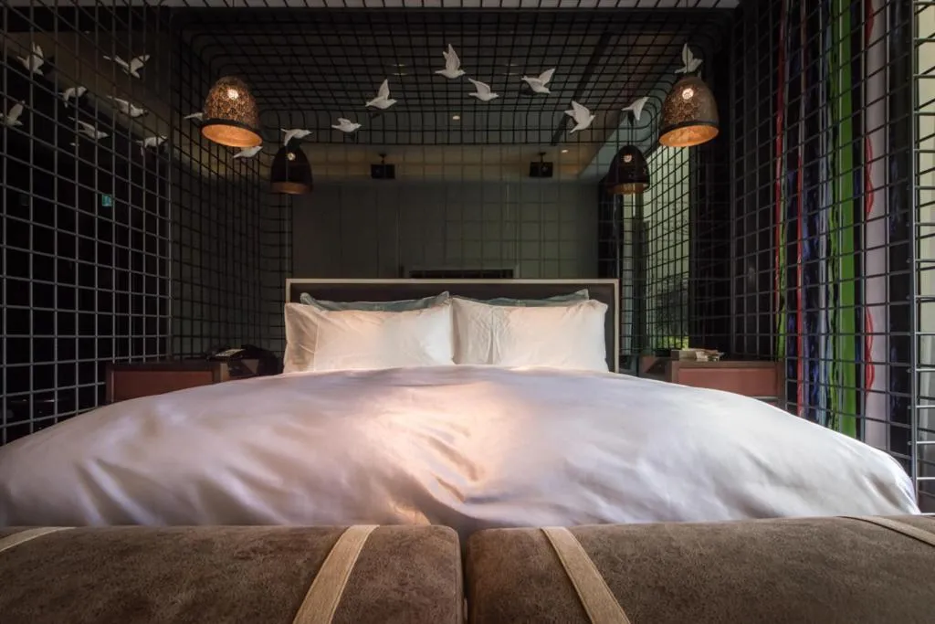 Bed in Green Palm Motel