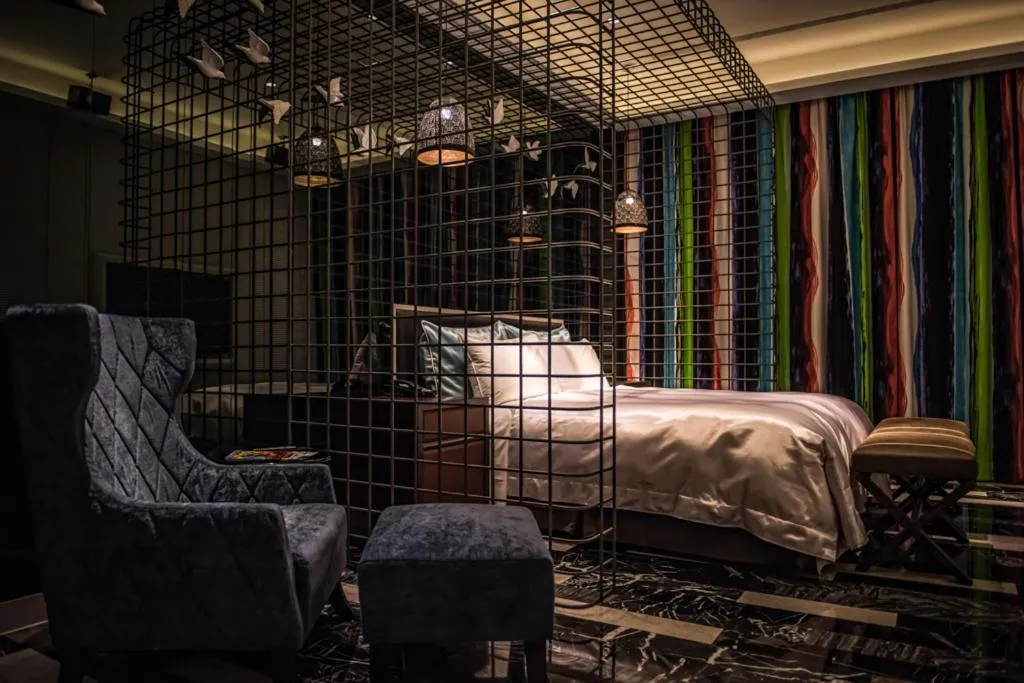 Bed in Green Palm Motel