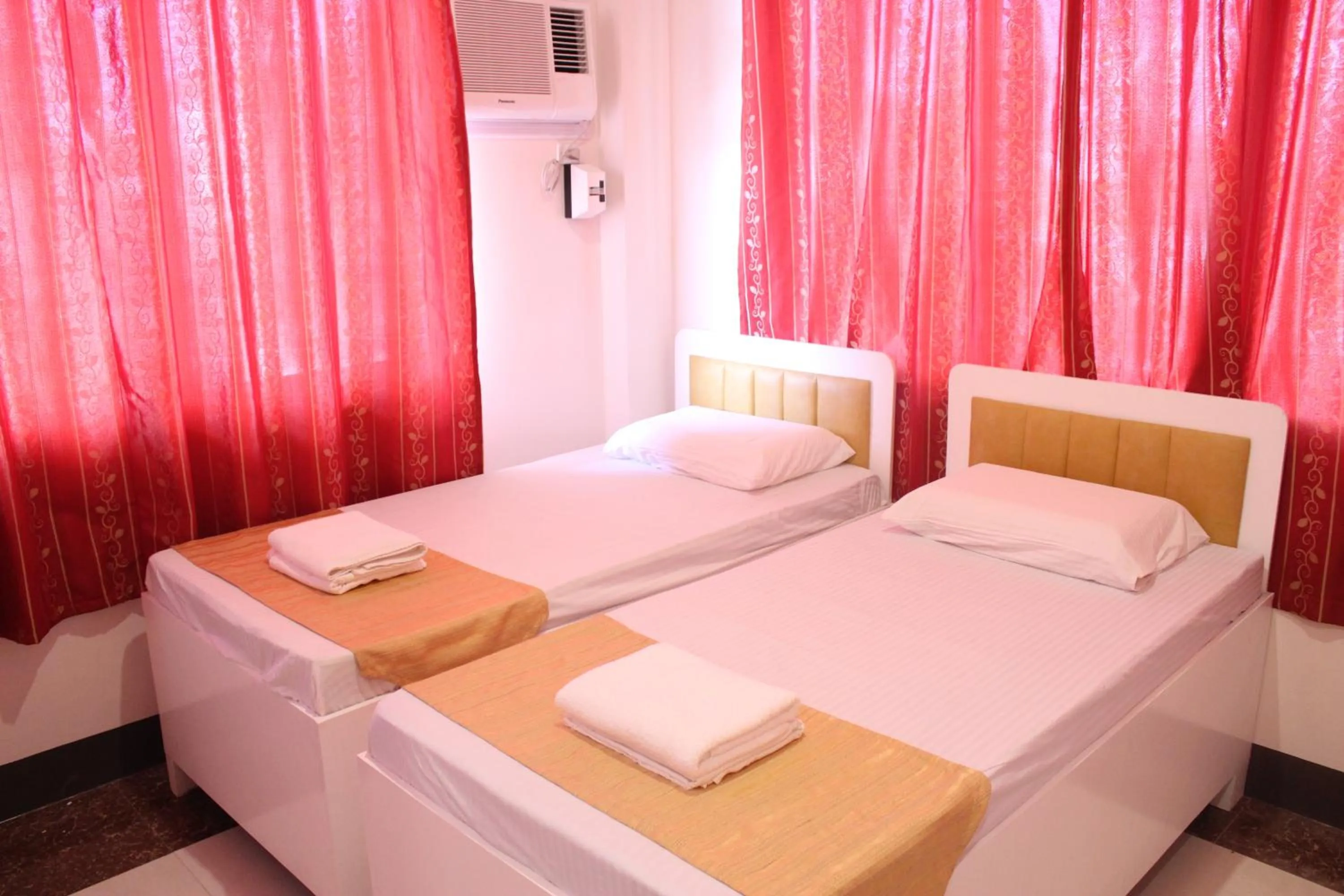 Bed in Butuan Grand Palace Hotel Annex
