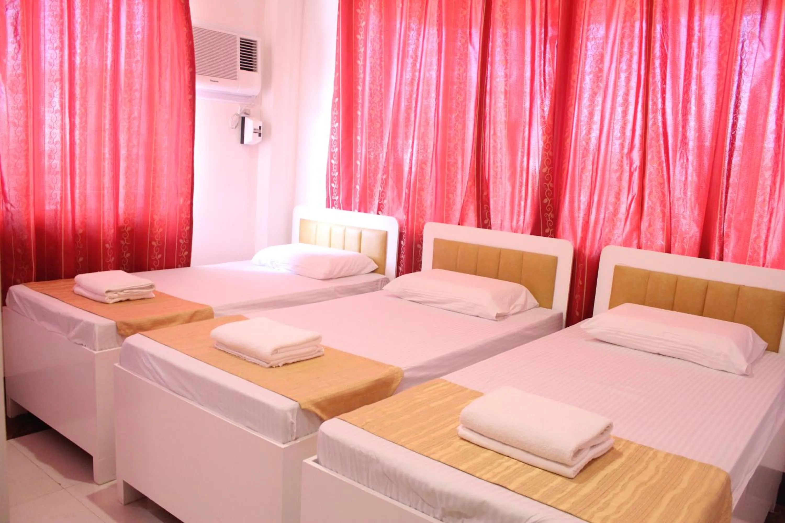 Bed in Butuan Grand Palace Hotel Annex