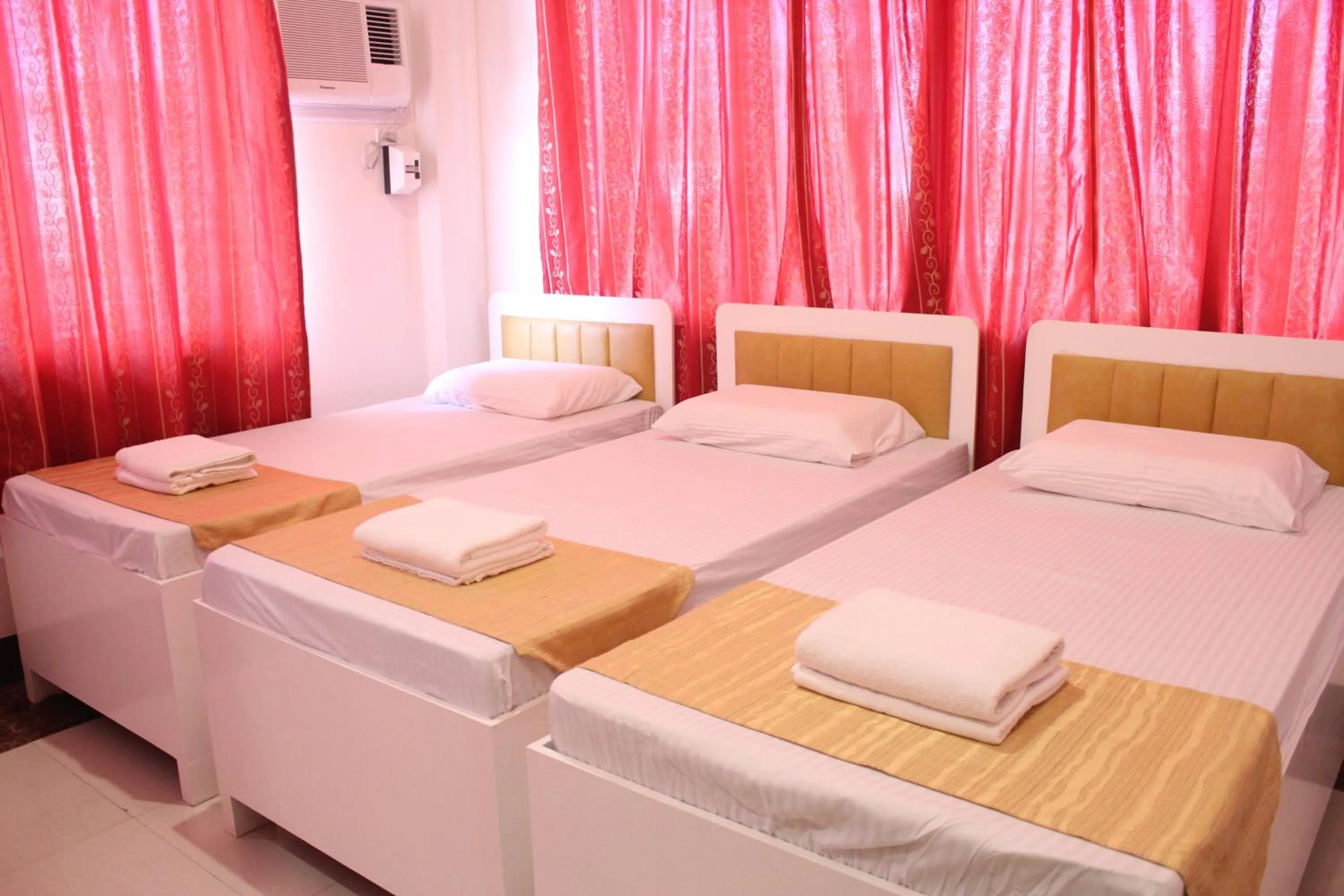 Bed in Butuan Grand Palace Hotel Annex