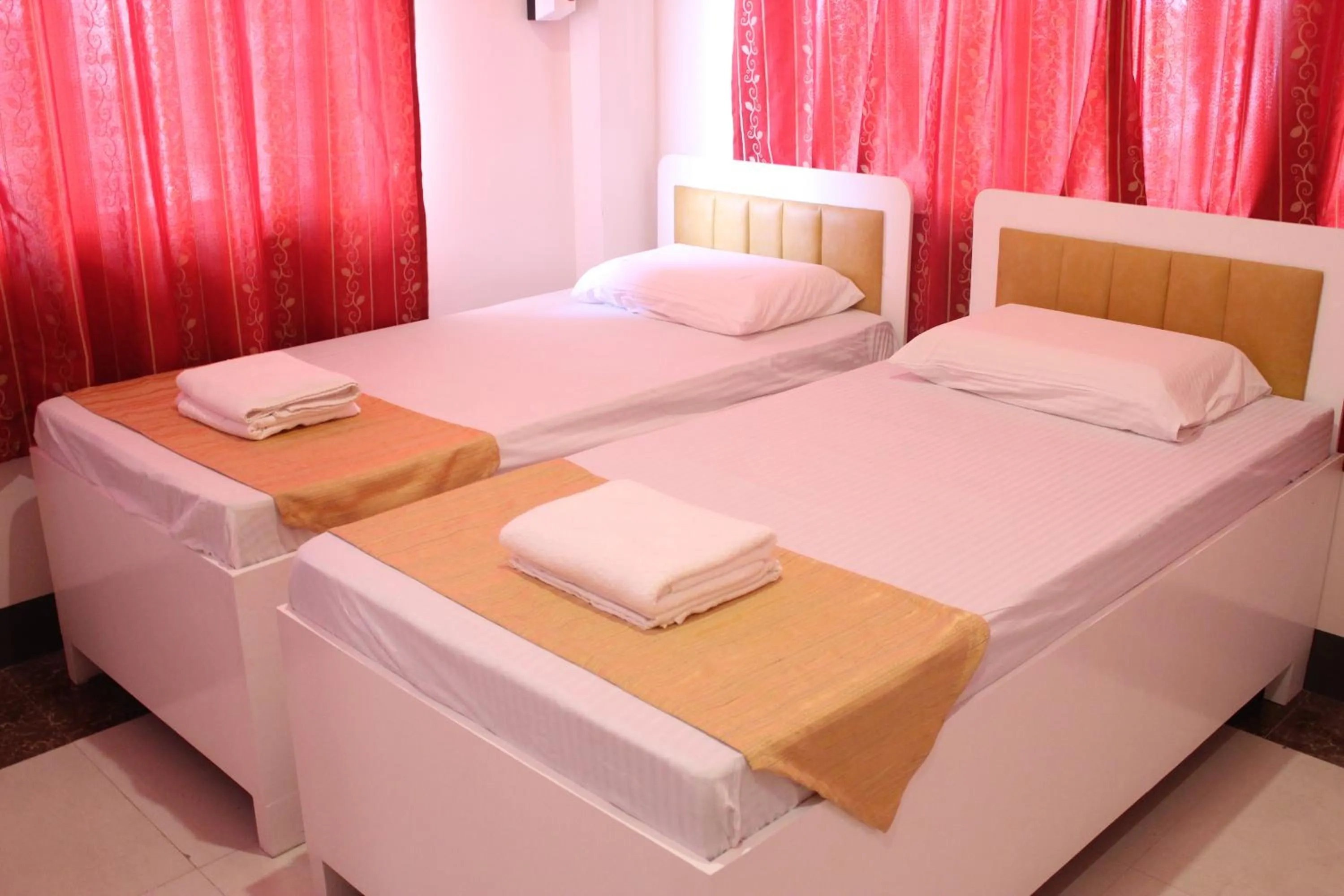 Bed in Butuan Grand Palace Hotel Annex