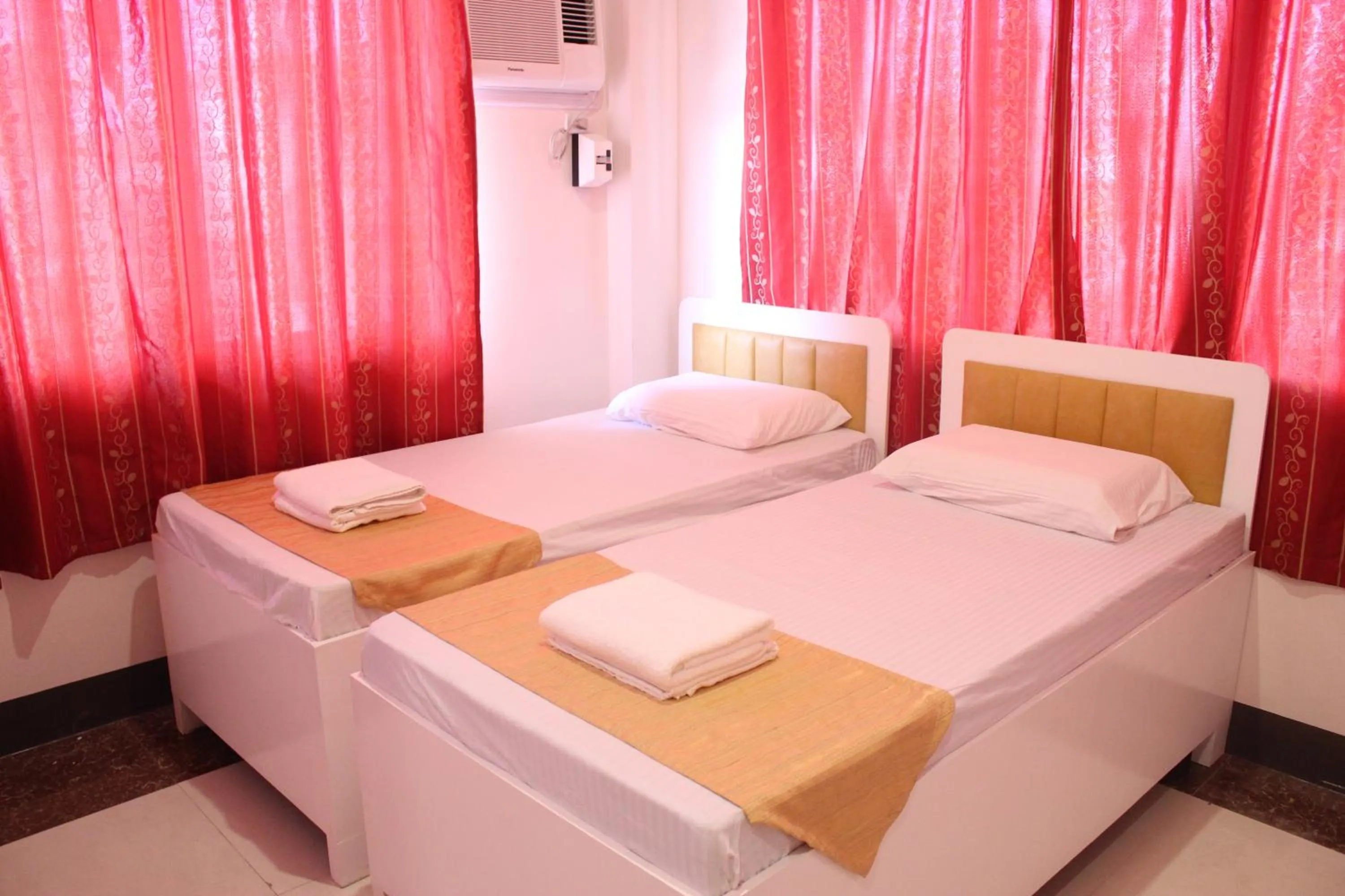 Bed in Butuan Grand Palace Hotel Annex