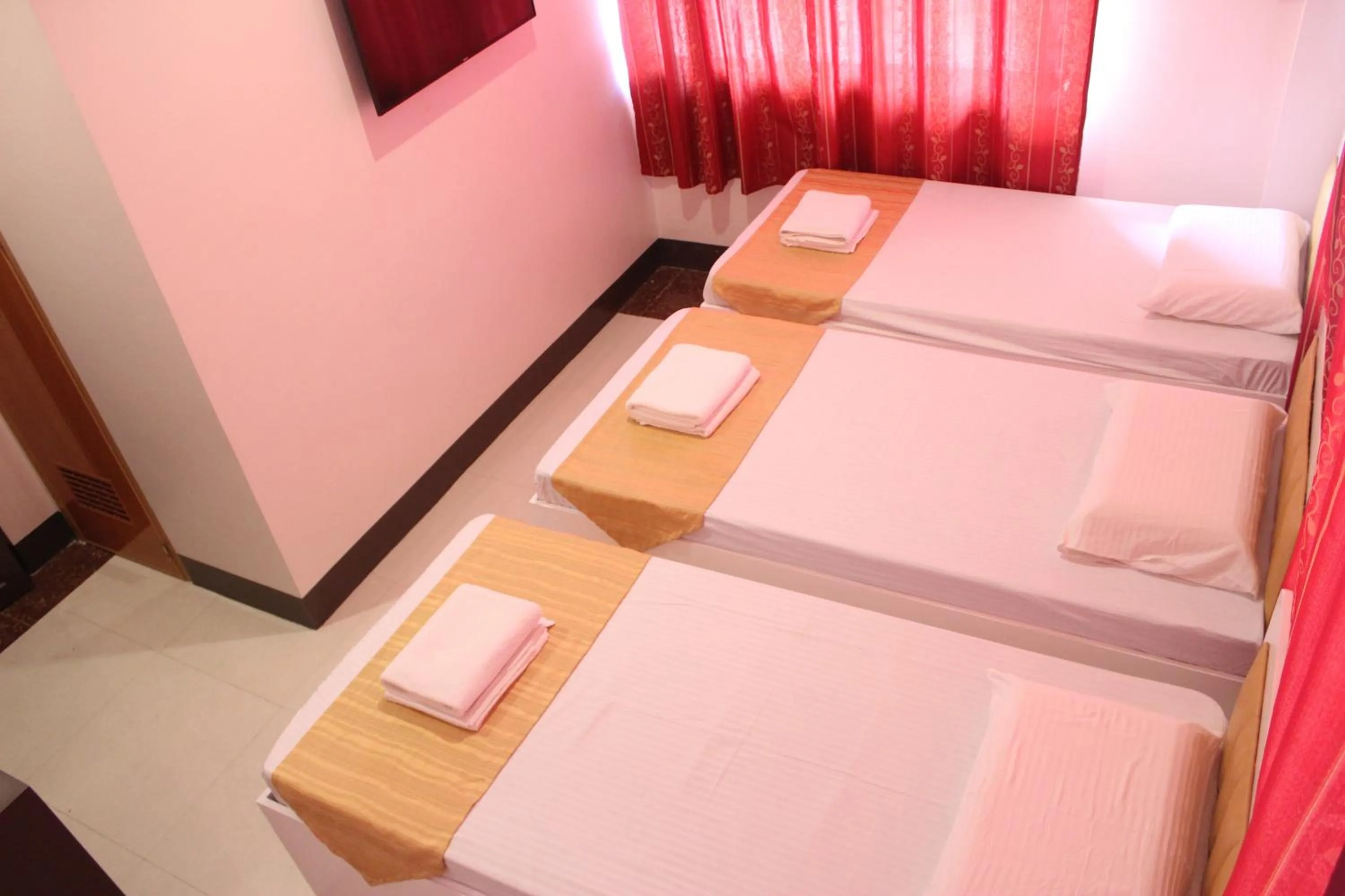 Bed in Butuan Grand Palace Hotel Annex