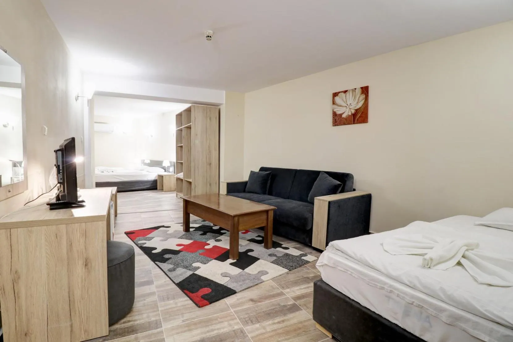 Seating area, Bed in Family Hotel Jupiter