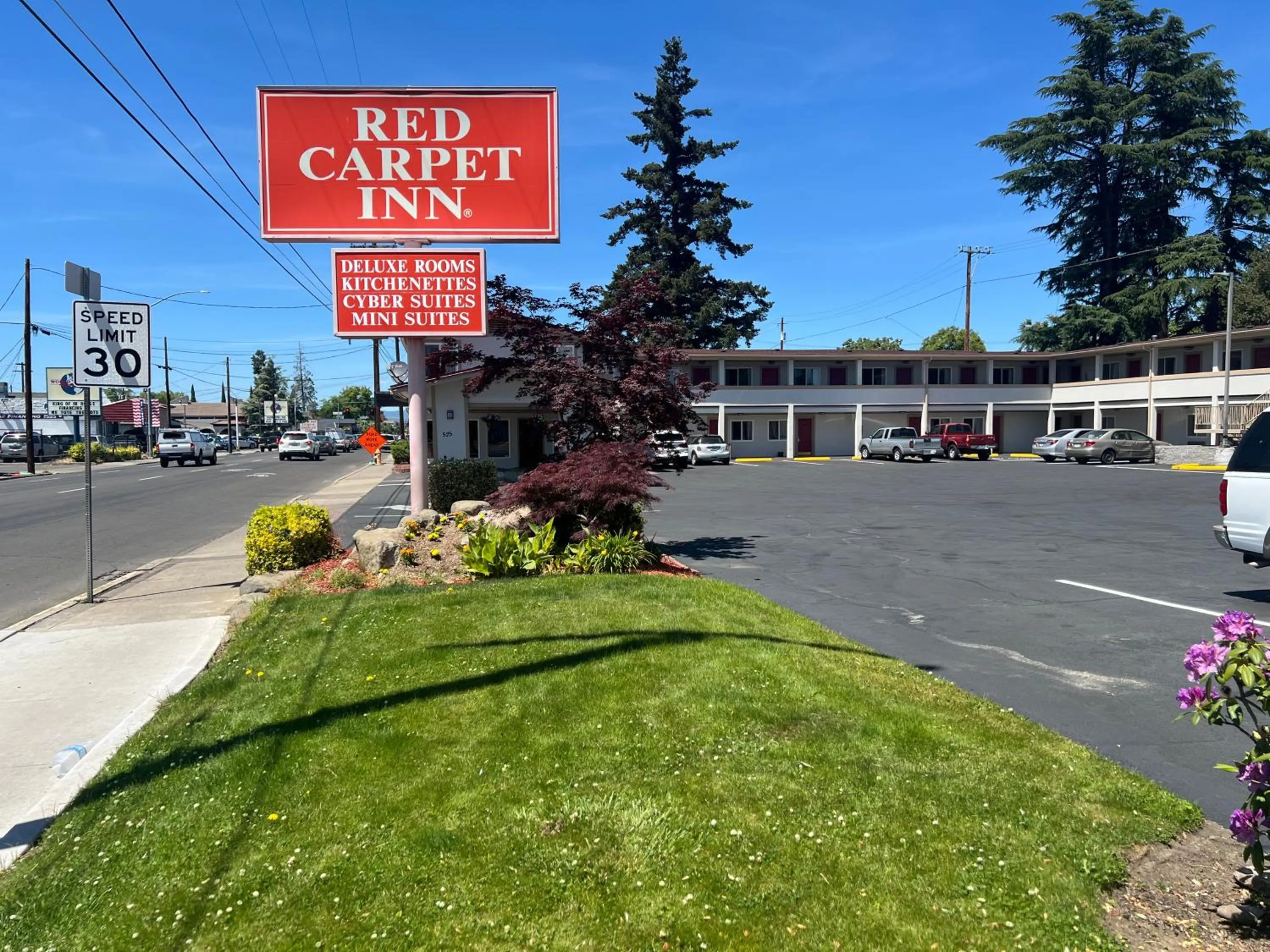 Property logo or sign in Red Carpet Inn Medford