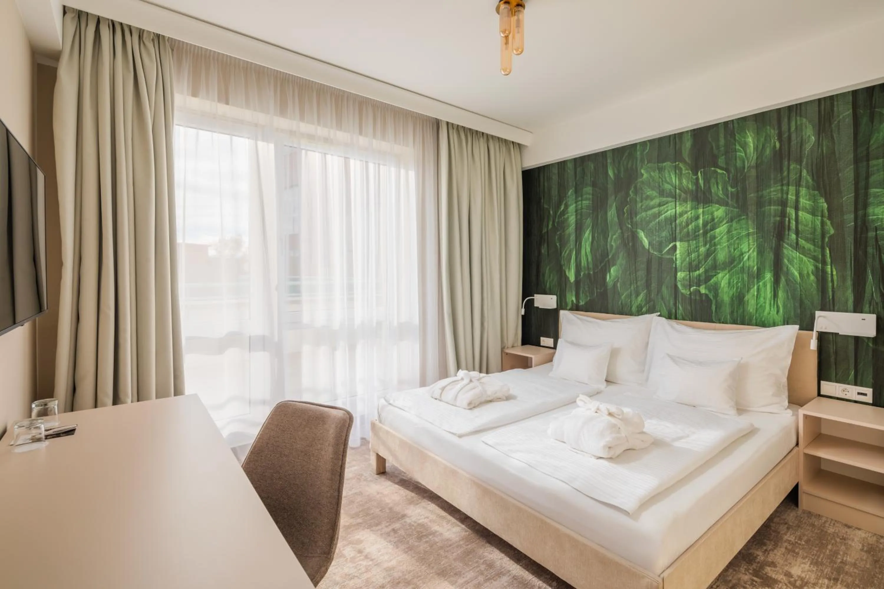 Bedroom, Bed in Hotel Atlantis Wellness & Conference