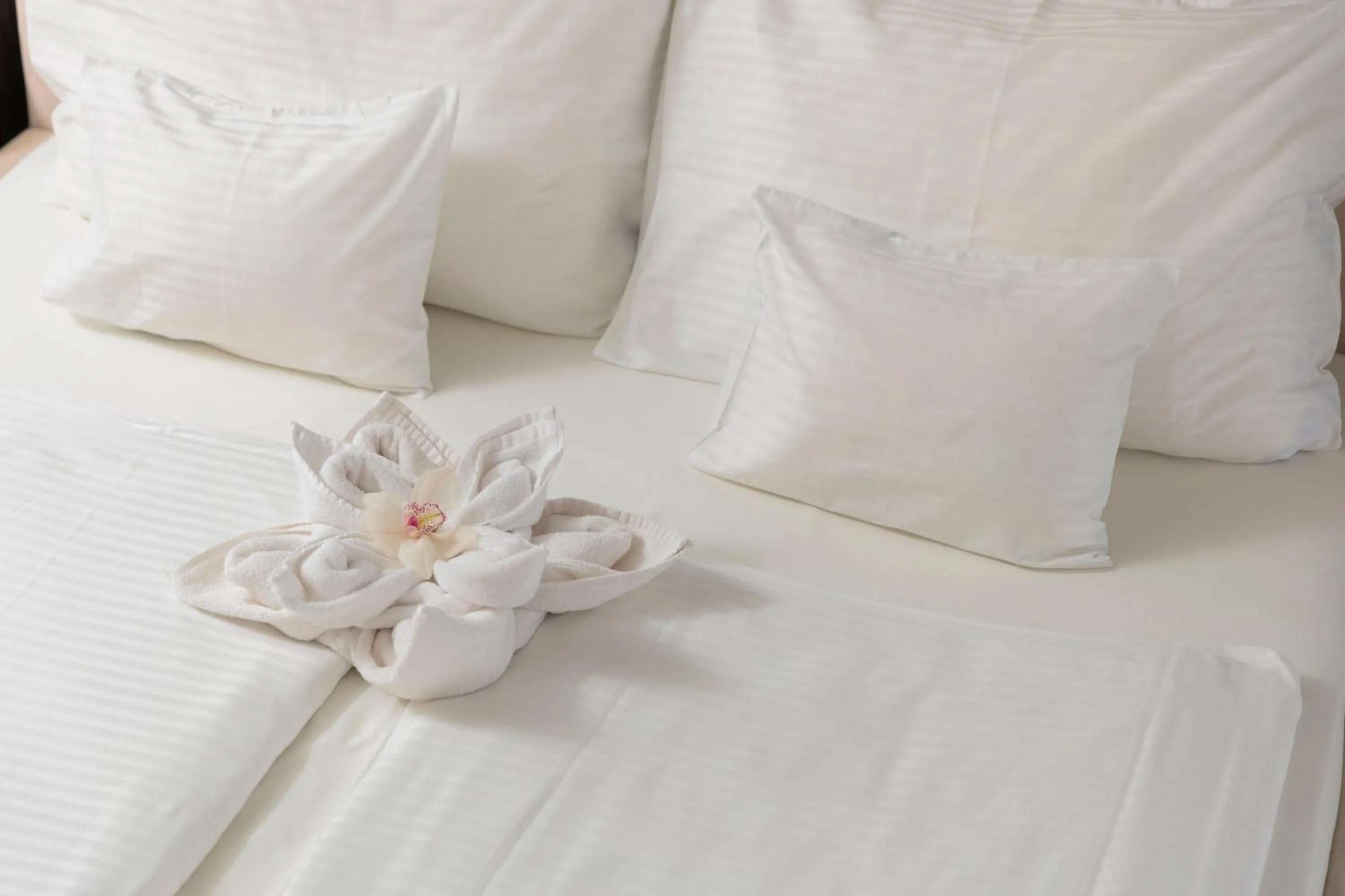 Bed in Hotel Atlantis Wellness & Conference