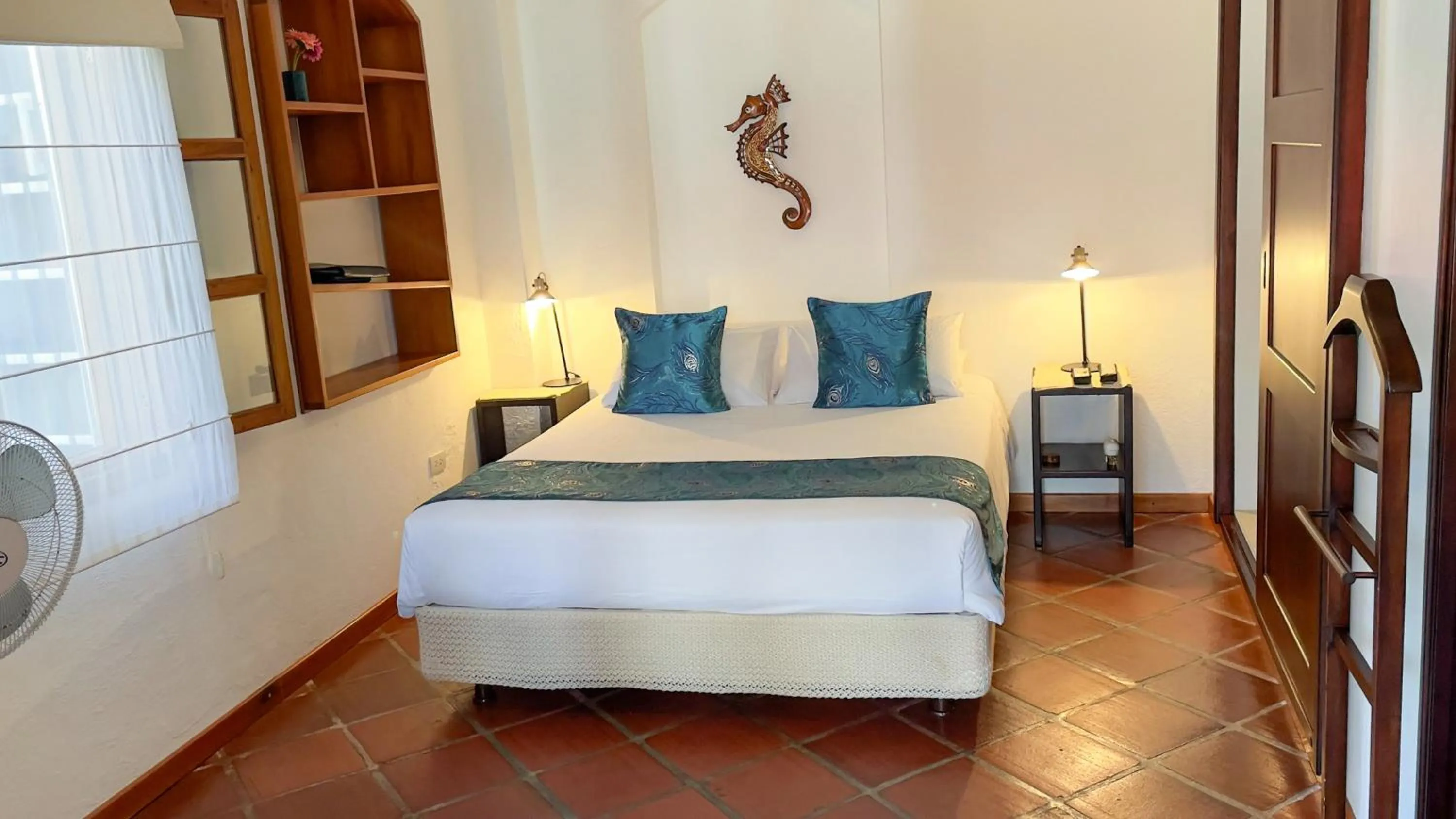 Bed in Hotel Galapagos Suites B&B