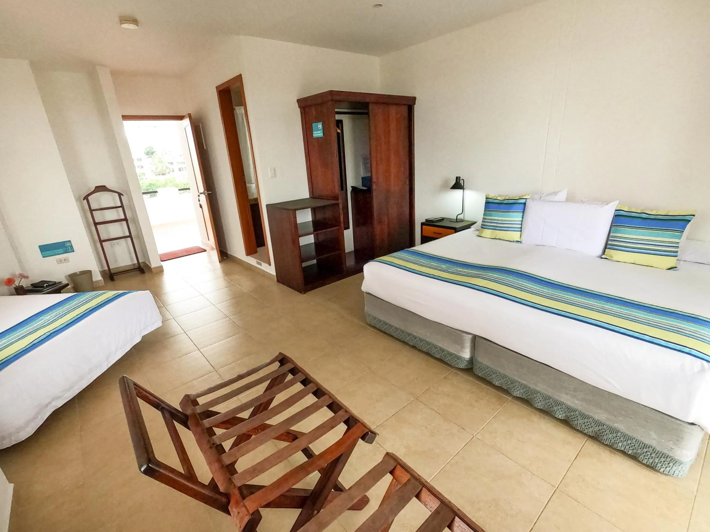 Bedroom, Bed in Hotel Galapagos Suites B&B