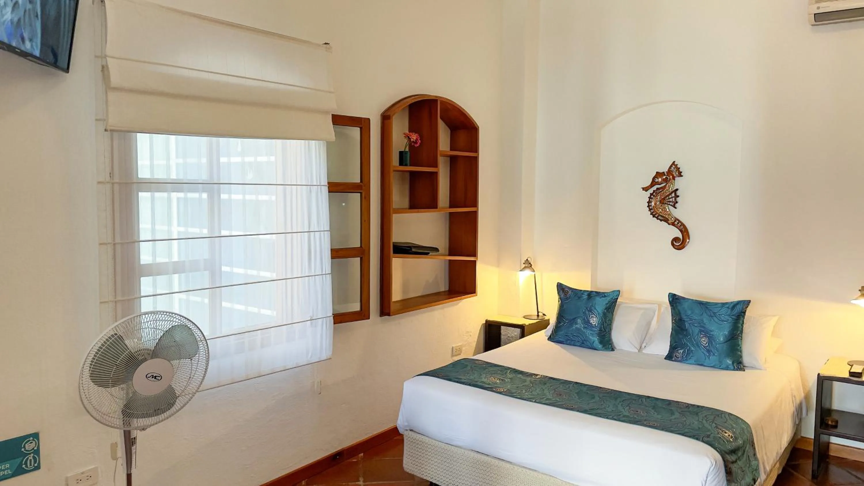 Bedroom, Bed in Hotel Galapagos Suites B&B