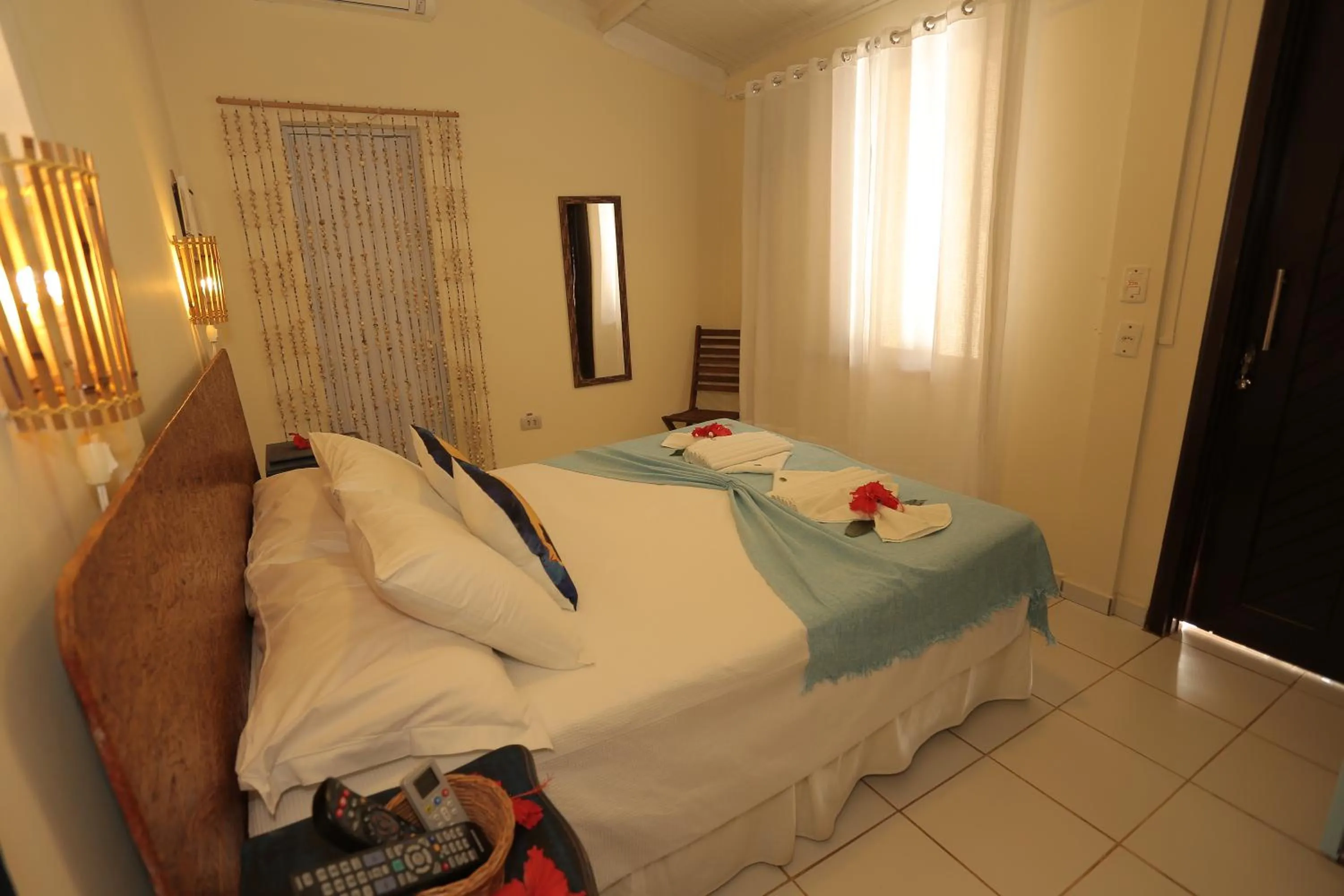 Photo of the whole room, Bed in Pousada Ilha do Frade