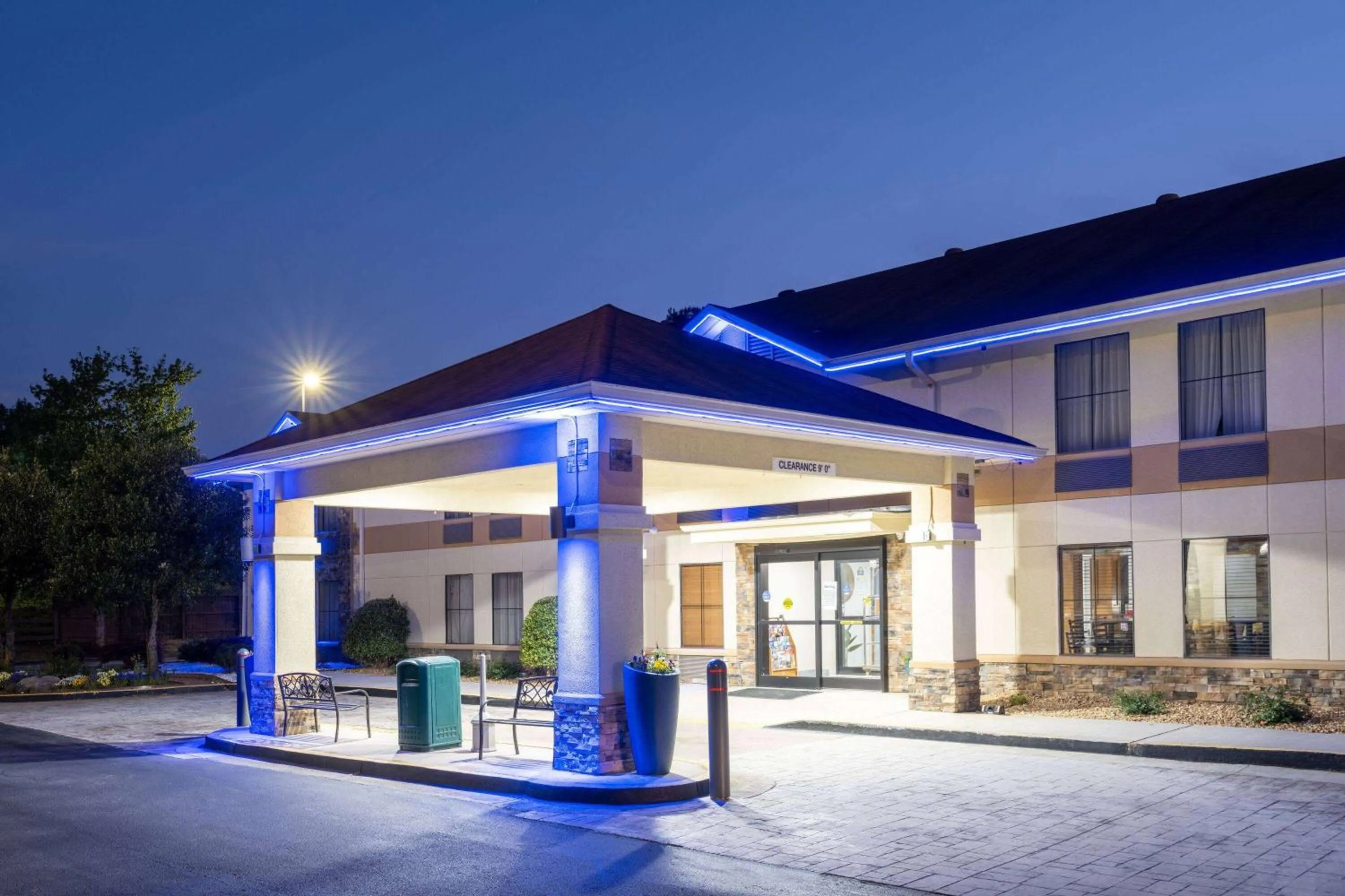 Property building in Days Inn & Suites by Wyndham Commerce