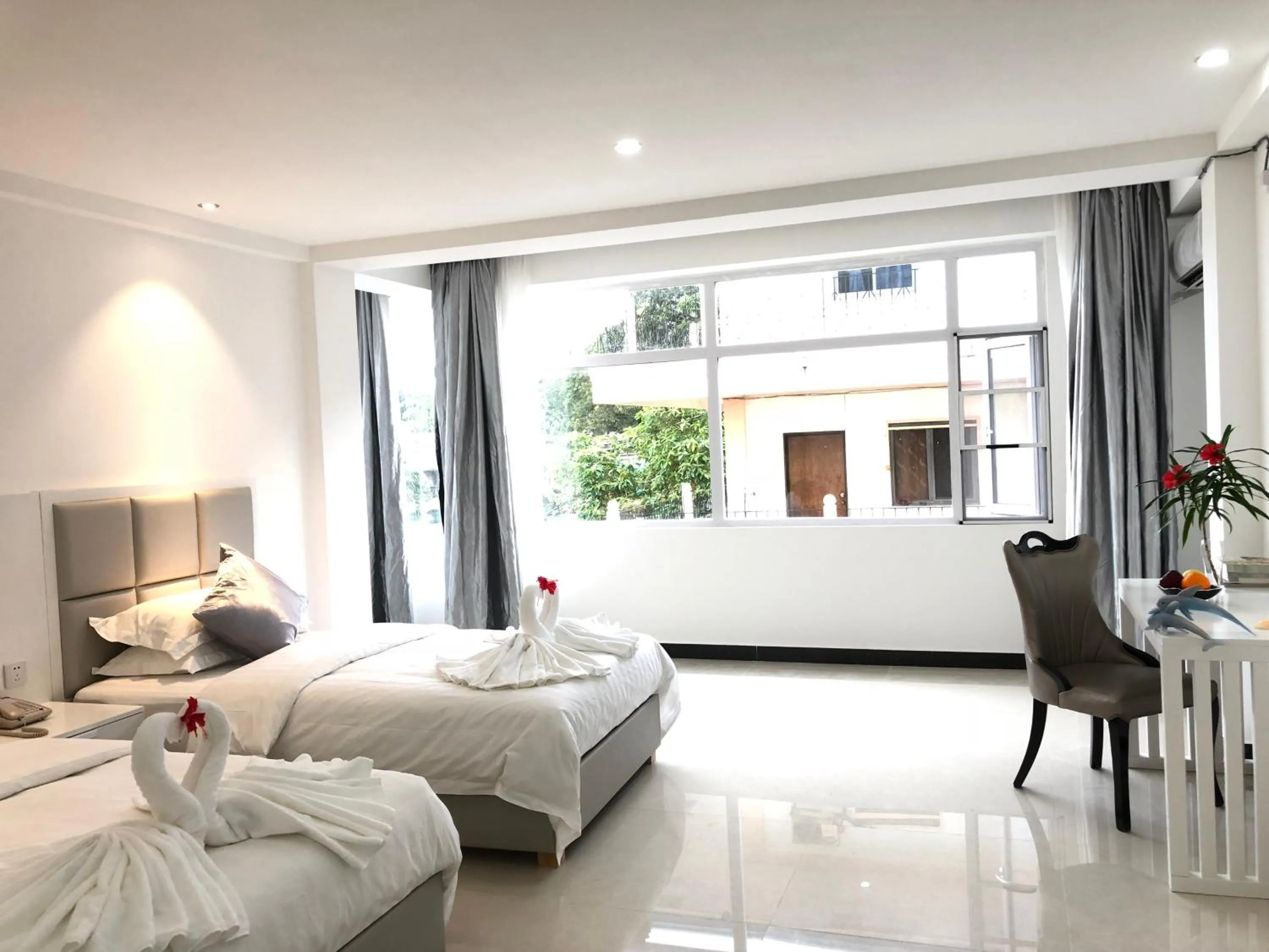 Bed in Ocean Star Hotel