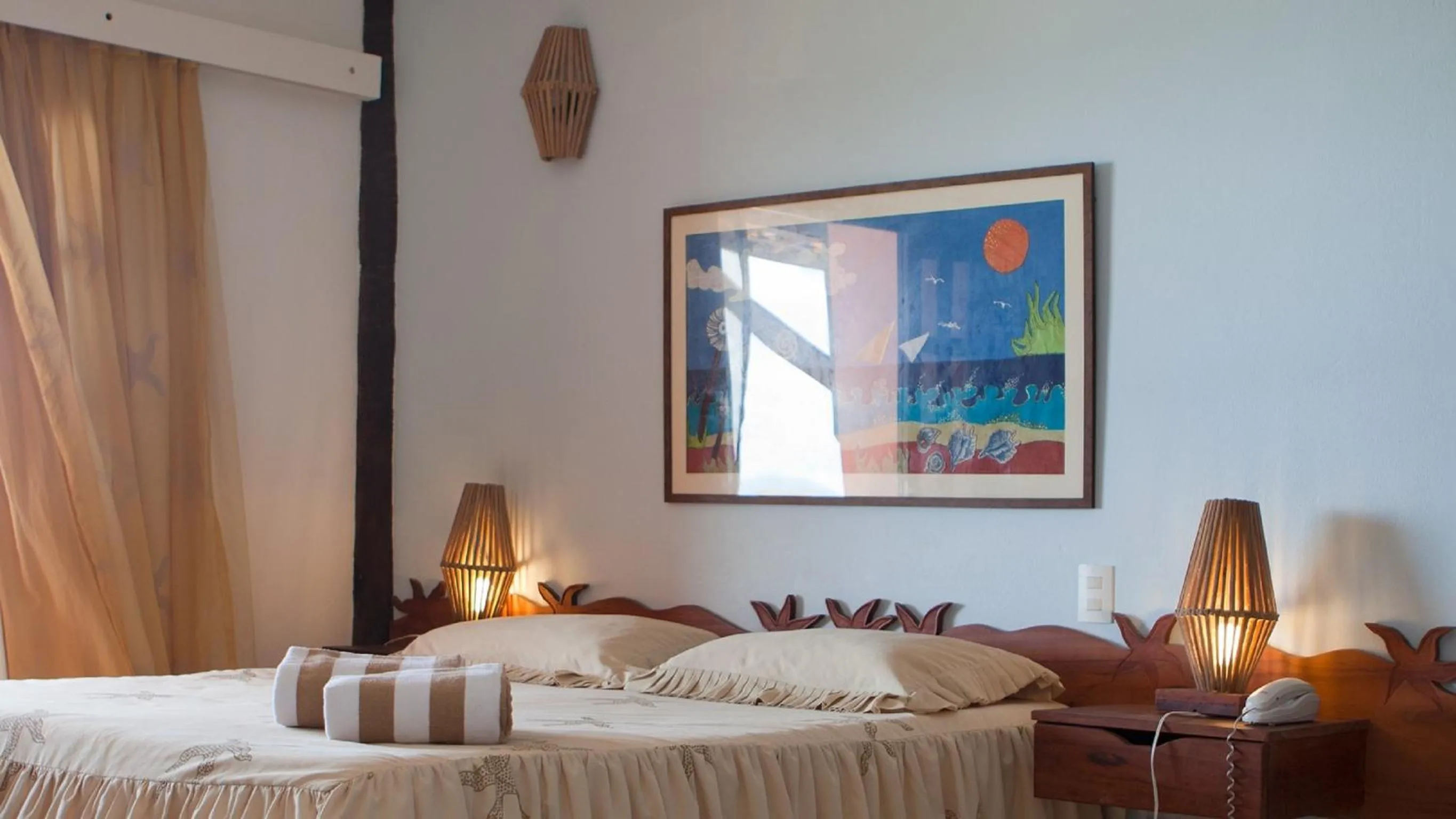 Bed in Bruno Marambaia Charme Hotel