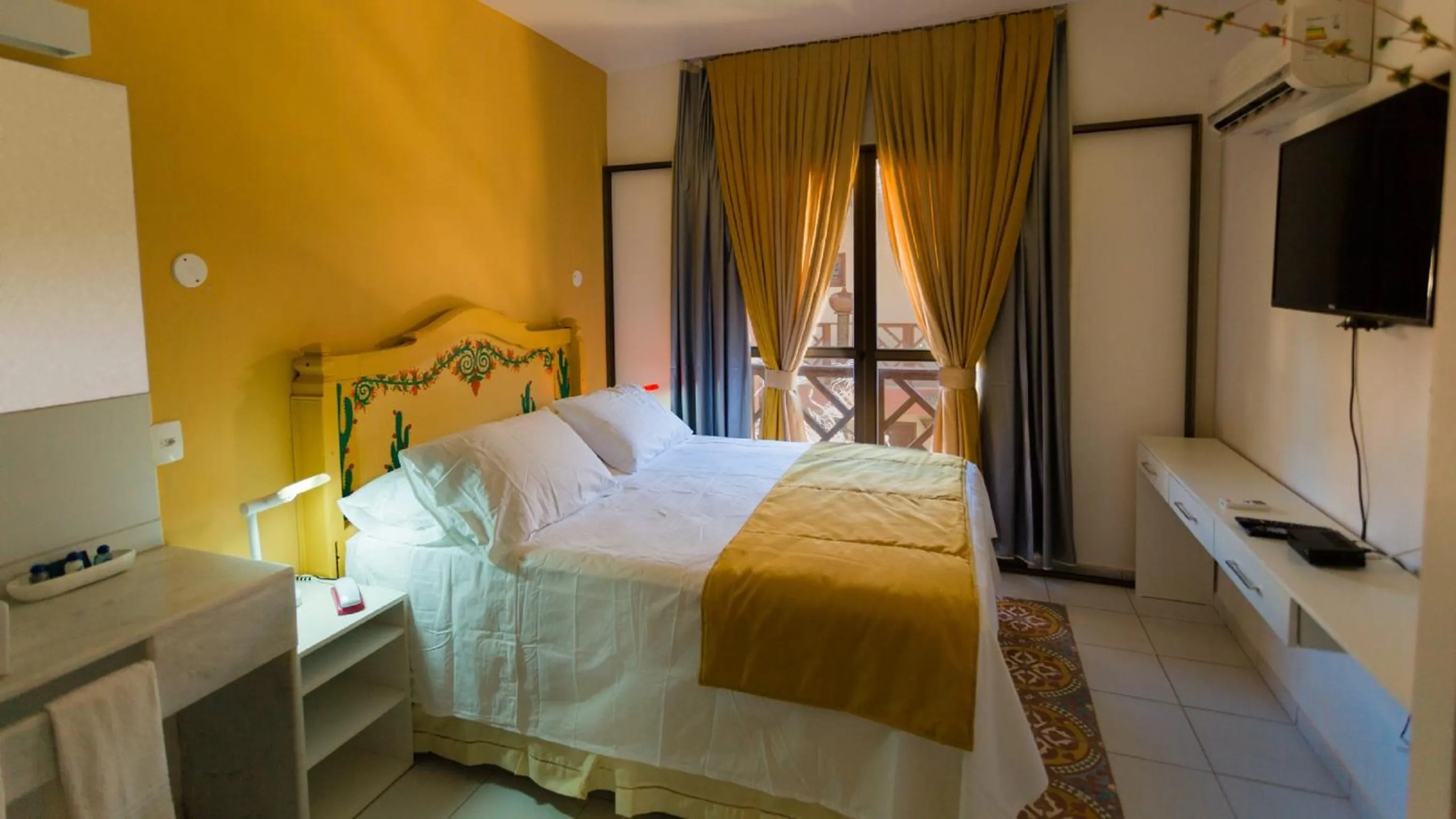 Bed in Bruno Marambaia Charme Hotel