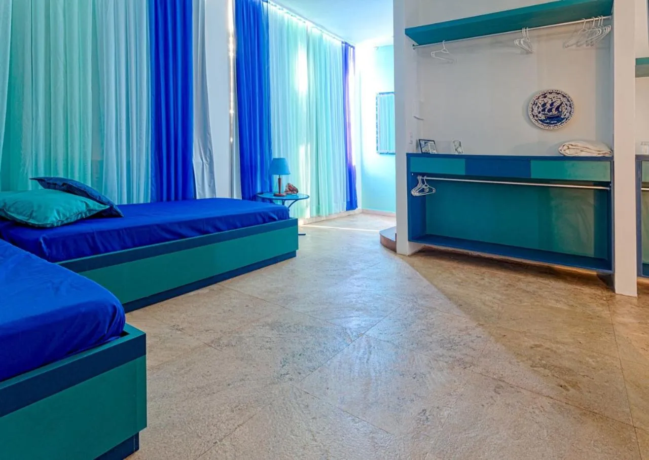 Bed in Bruno Marambaia Charme Hotel