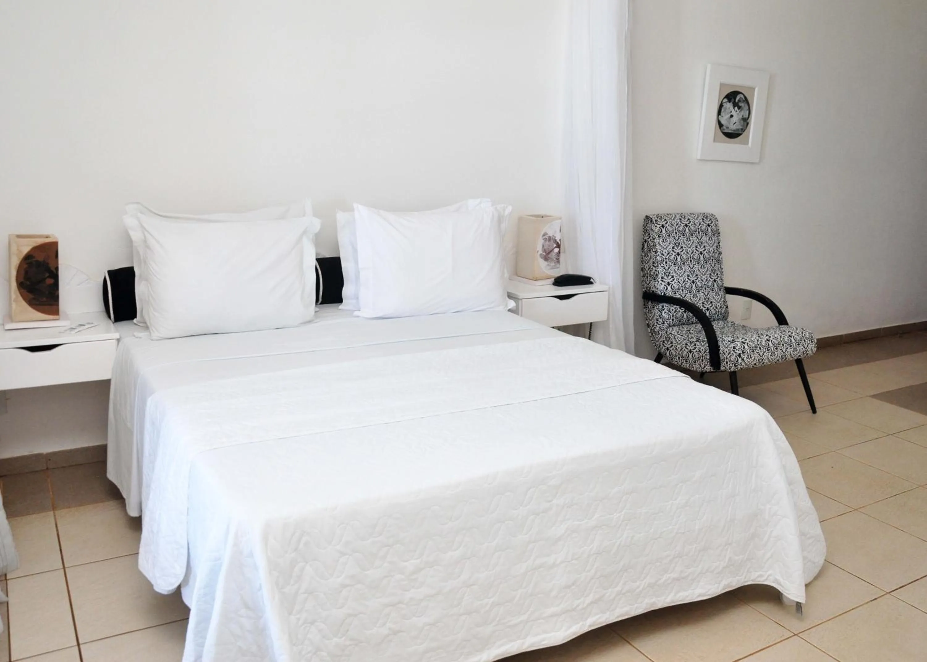 Bed in Bruno Marambaia Charme Hotel