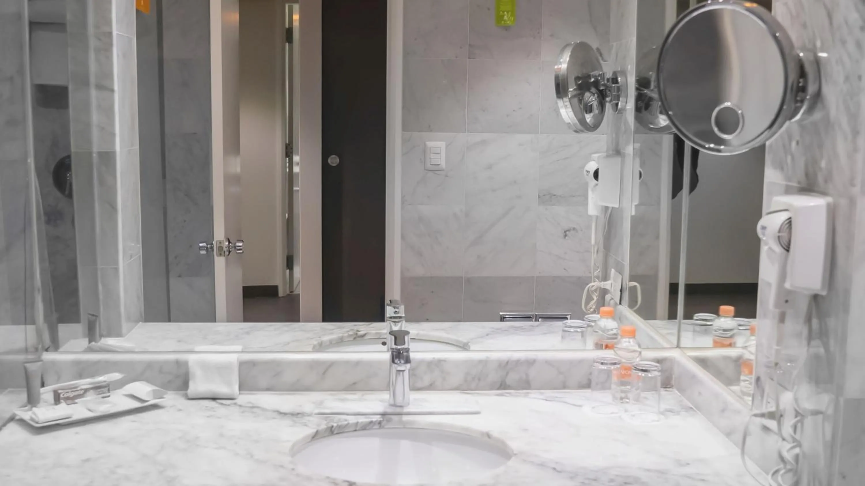 Bathroom in Real Inn Tijuana by Camino Real Hoteles