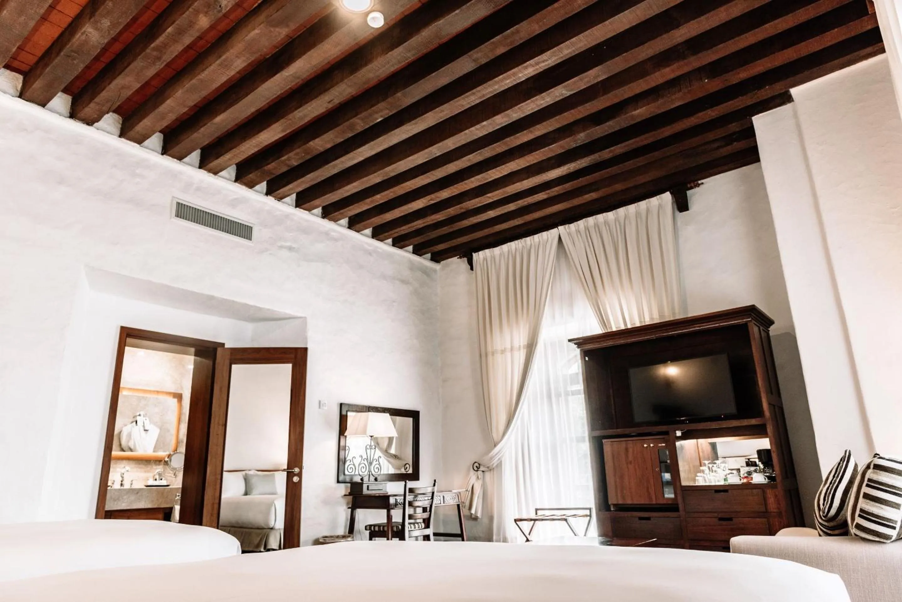 Bedroom, Bed in Quinta Real Oaxaca