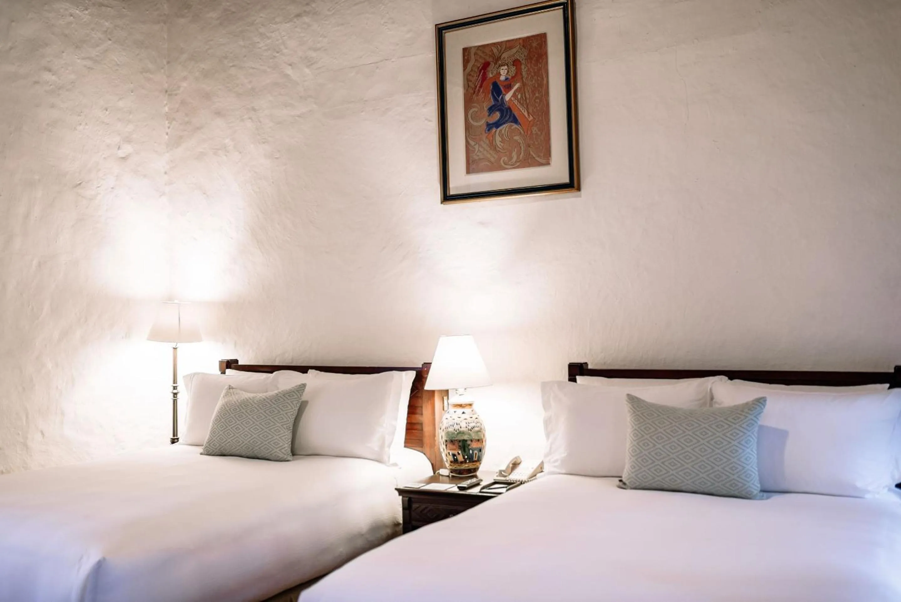 Bedroom, Bed in Quinta Real Oaxaca