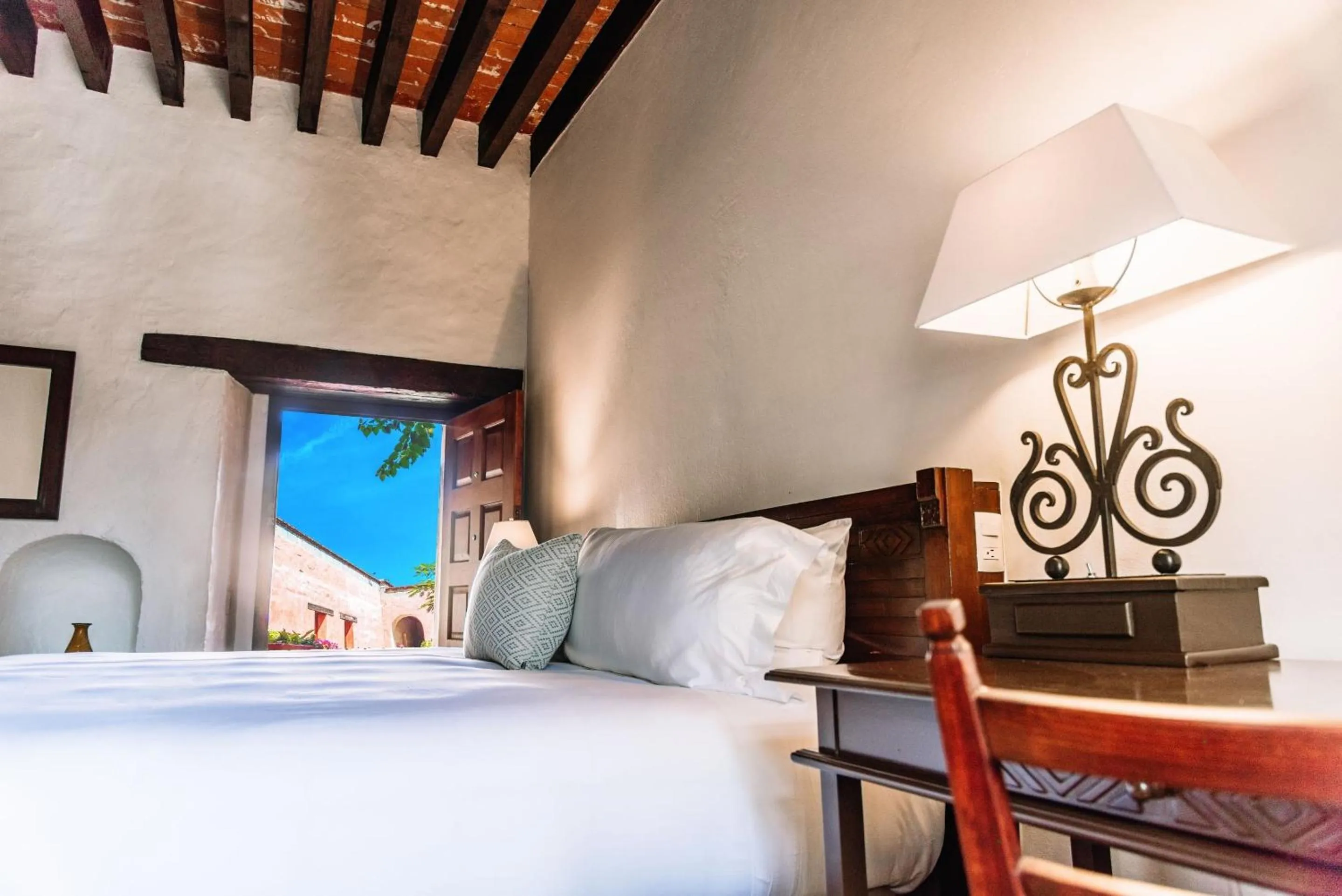 Bedroom, Bed in Quinta Real Oaxaca