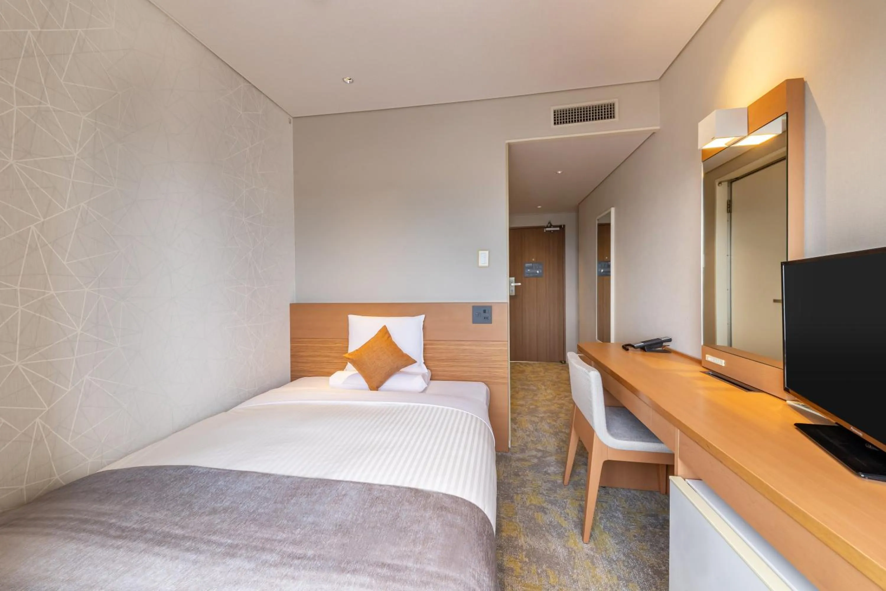 Bed in Art Hotel Niigata Station