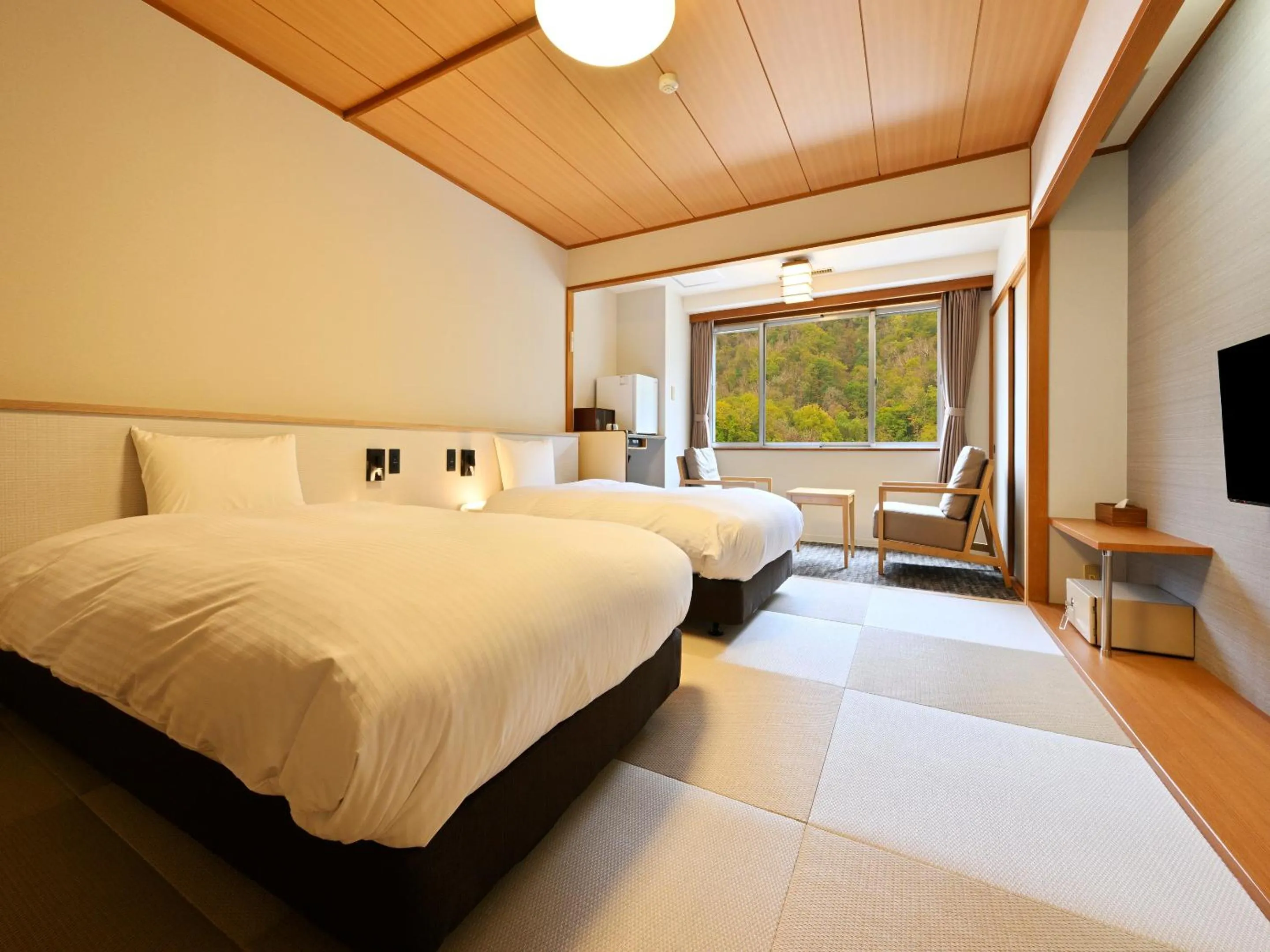 Photo of the whole room, Bed in Noboribetsu Manseikaku