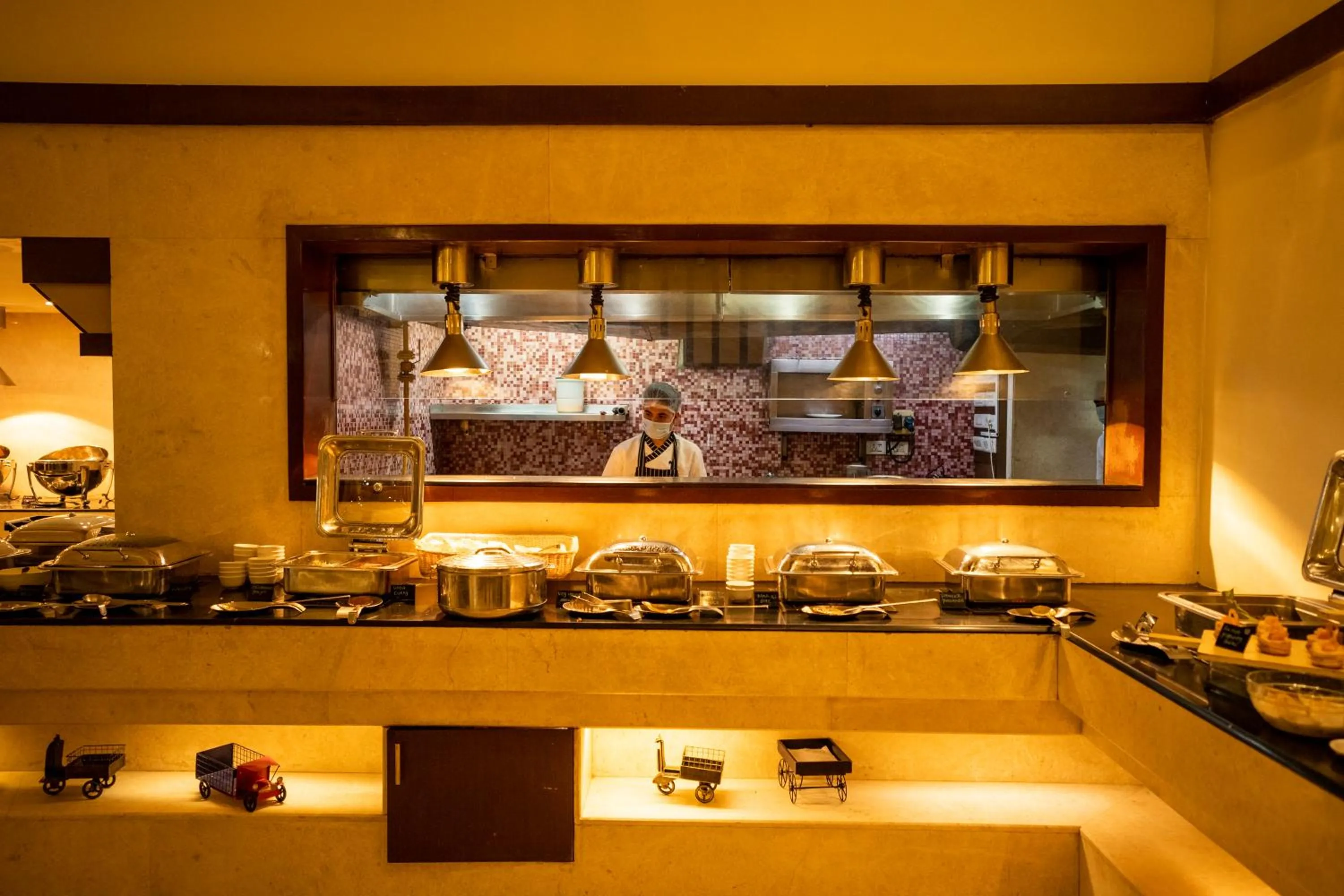 Kitchen or kitchenette in Royal Orchid Central, Shimoga