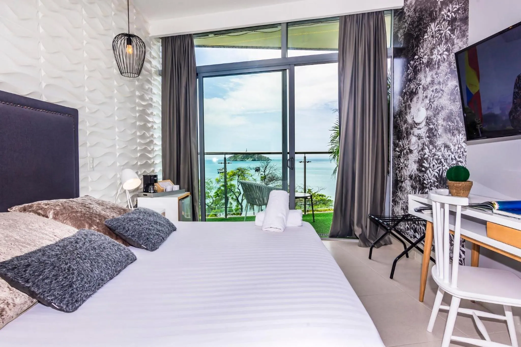 Photo of the whole room, Bed in Bonita Bay Concept Hotel by Xarm Hotels